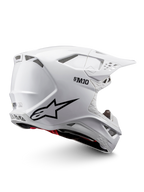 Alpinestars Supertech M10 Solid hjälm, vit glänsande motocrosshjälm med svart grafik, röda detaljer, ventilationsportar, skärmvisir och ECE 22.06-certifiering