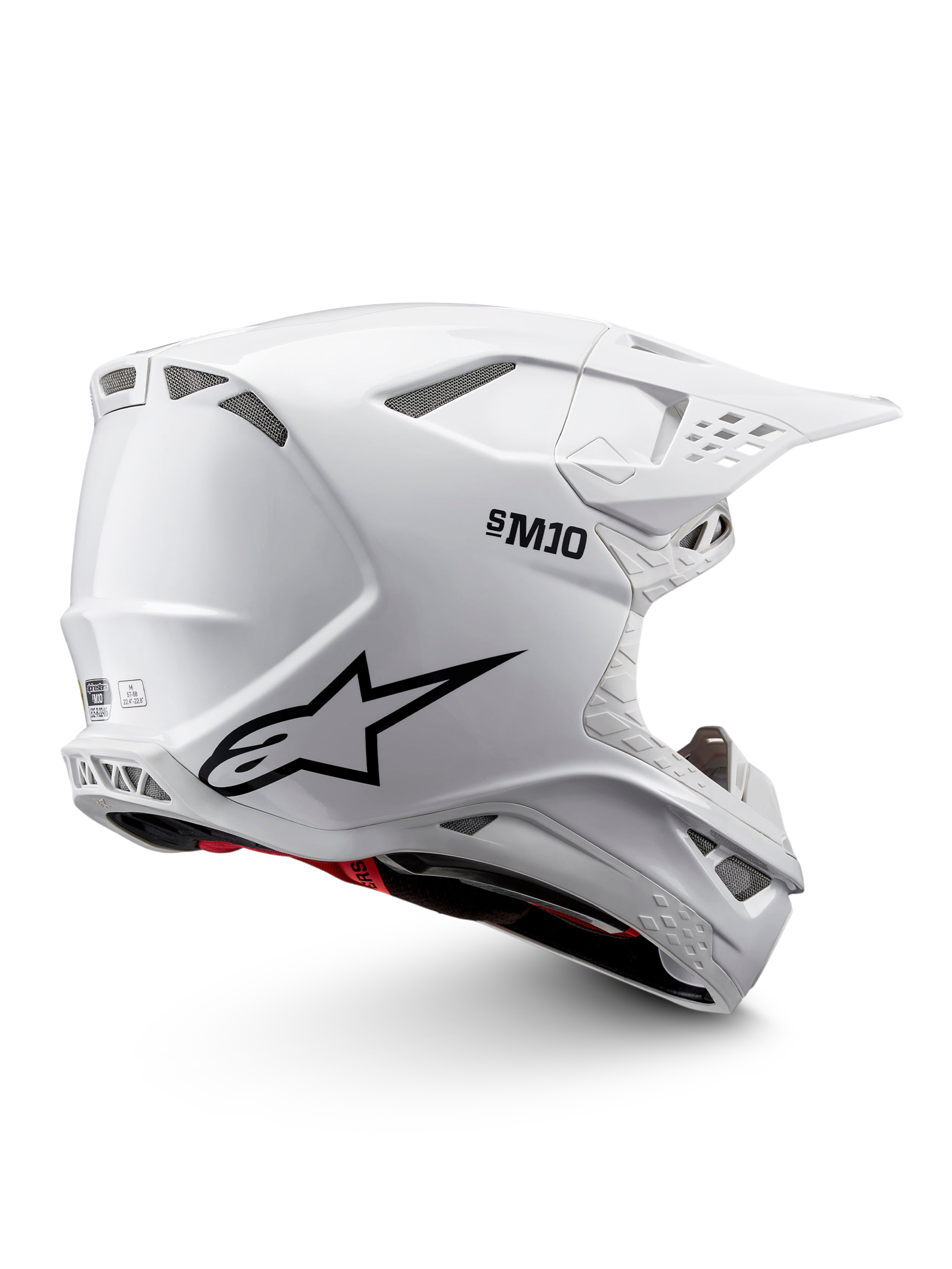 Alpinestars Supertech M10 Solid hjälm, vit glänsande motocrosshjälm med svart grafik, röda detaljer, ventilationsportar, skärmvisir och ECE 22.06-certifiering