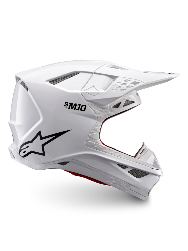 Alpinestars Supertech M10 Solid-hjälm, ECE 22.06-certifierad vit glansig motocrosshjälm med svart logotyp, skärm och ventilerad heltäckande design i sidovy