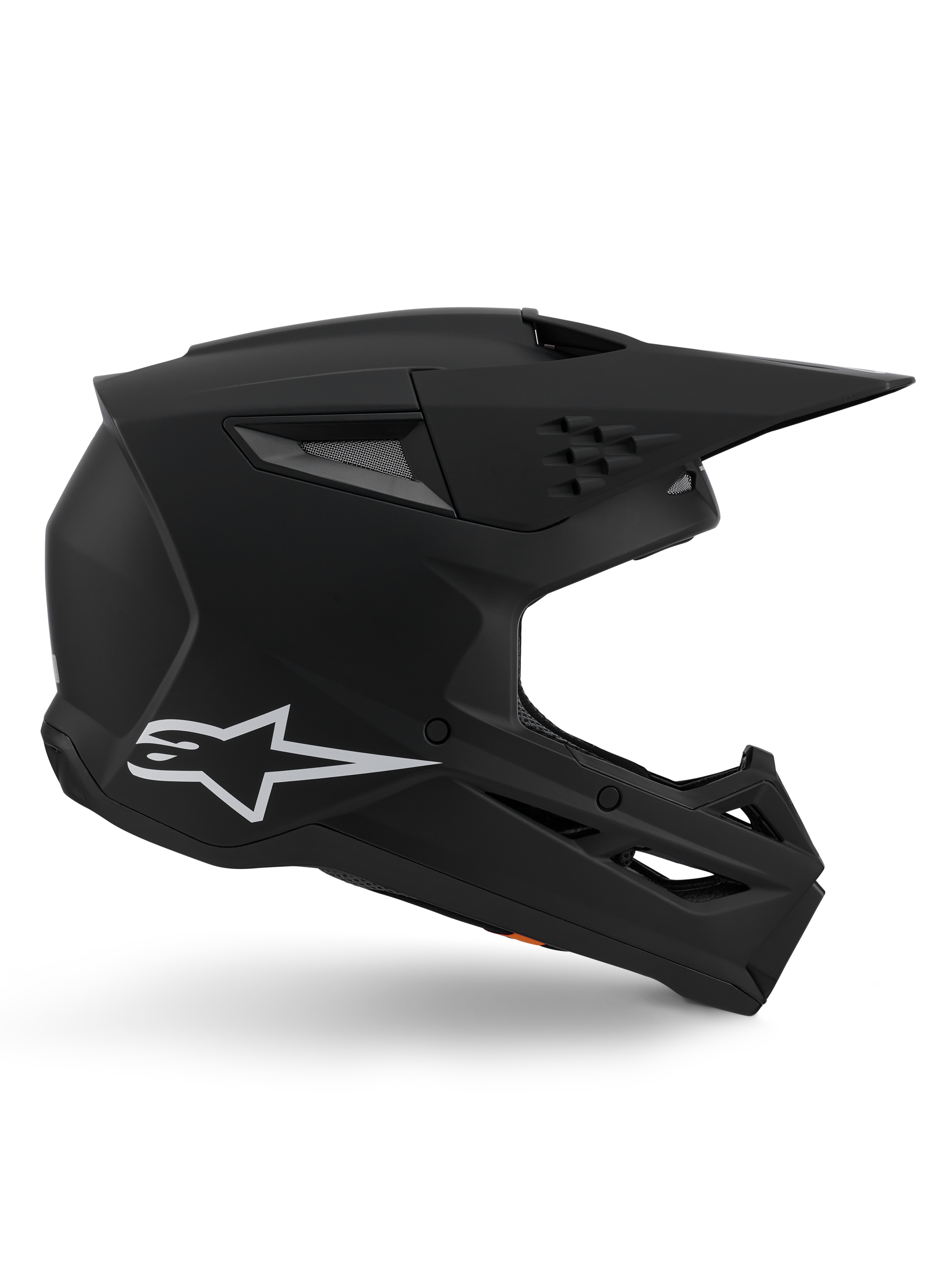 Alpinestars S-M3 Solid hjälm, motocrosshjälm, mattsvart finish, sidoprofil med en vit Alpinestars-logotyp, aerodynamiskt skal med flera ventilationsportar och ett stort visir, professionell skyddsutrustning för terrängkörning