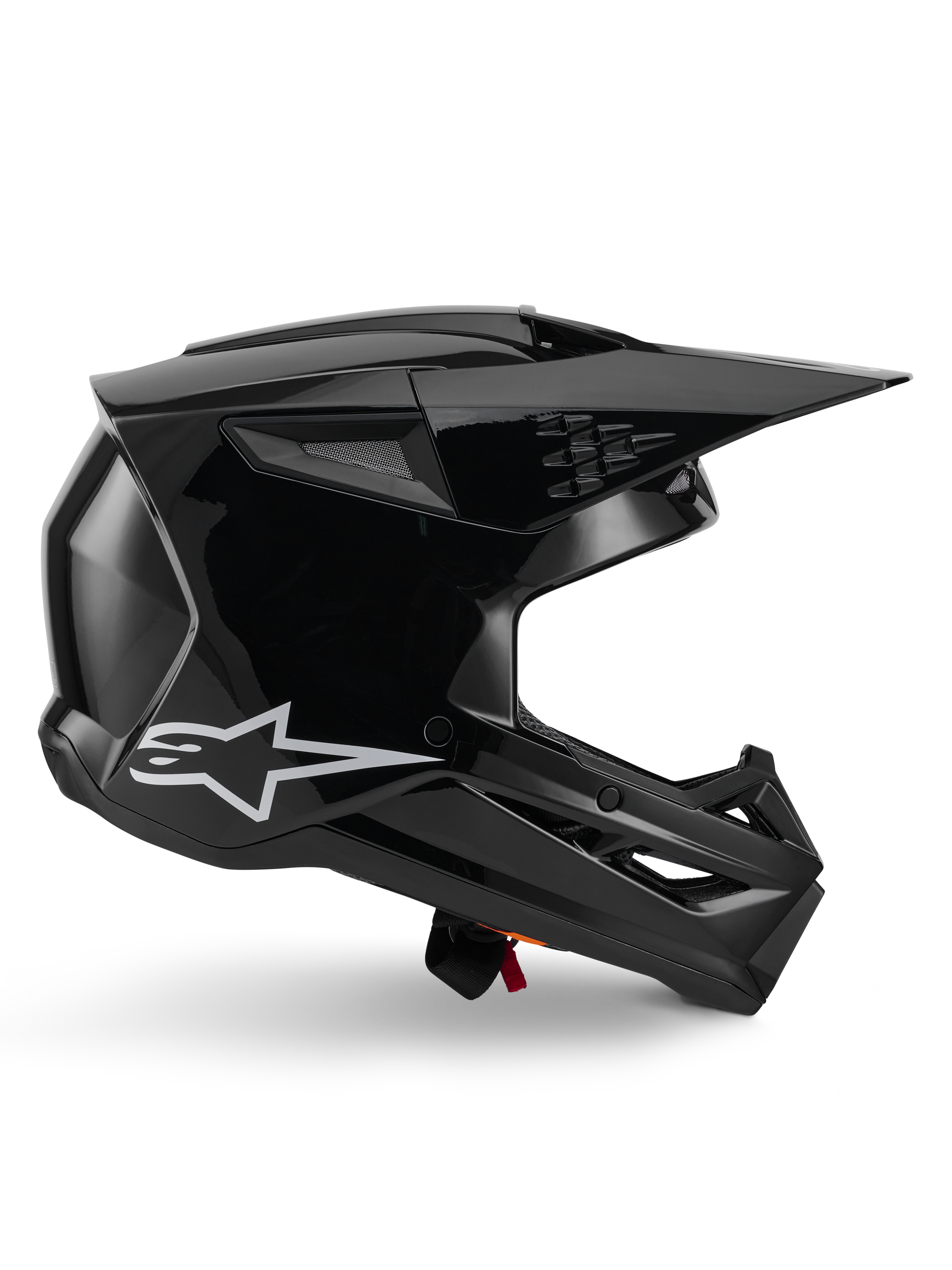 Alpinestars S-M3 Solid-hjälm, motocrosshjälm, blanksvart, profilvy med en vit stjärnlogotyp, vinklad aerodynamisk design med nätförsedda ventiler och skärm, skyddande huvudbonad för off-road-racing