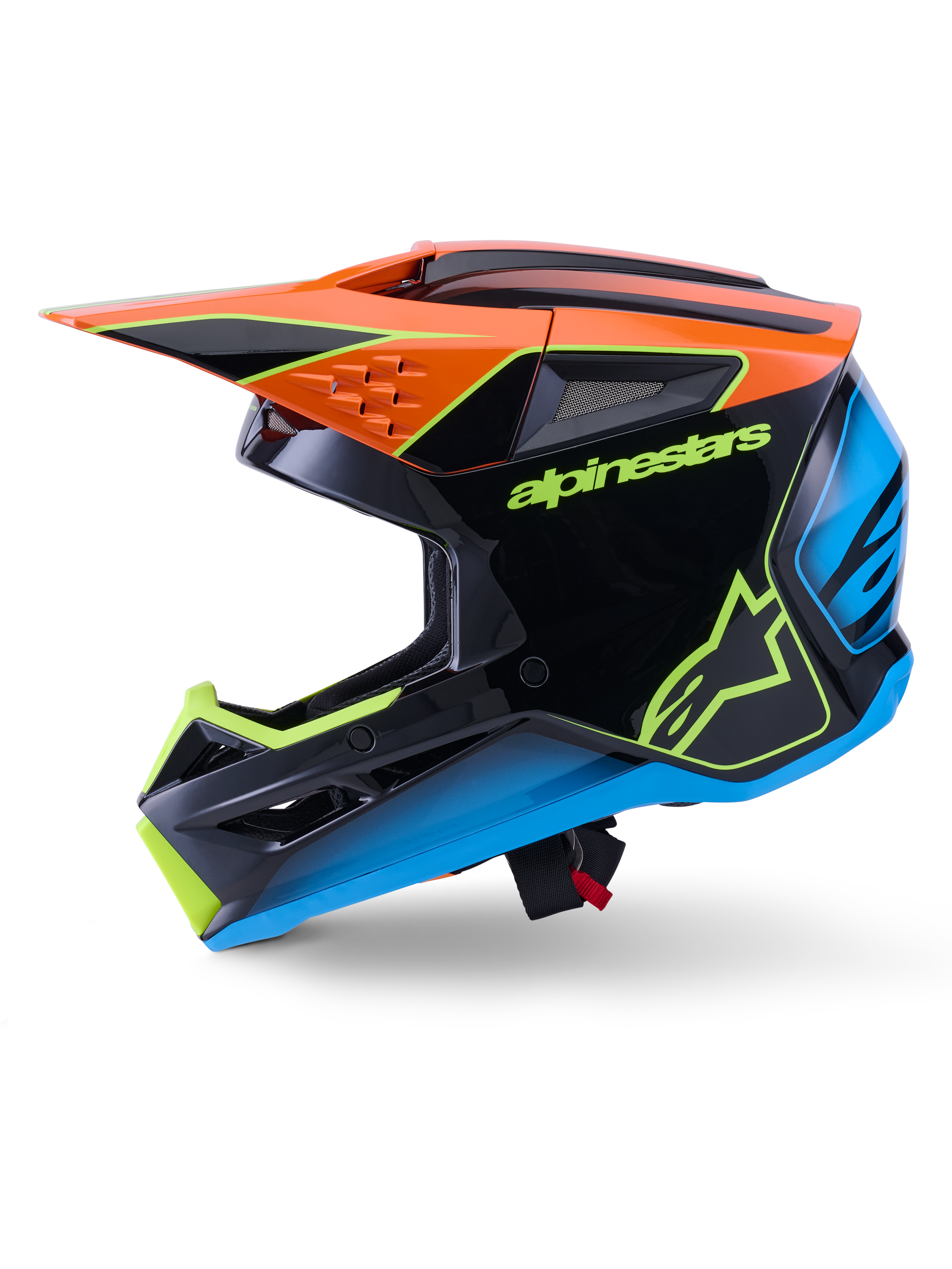 Alpinestars S-M3 Fray Hjälm ECE 22.06, motocrosshjälm, svart med orangea, blå och fluorescerande gula accenter, sidoprofilvy som visar det aerodynamiska skalet och integrerade ventilationsportar, med tydlig Alpinestars-logotyp, professionellt skydd för terrängkörning