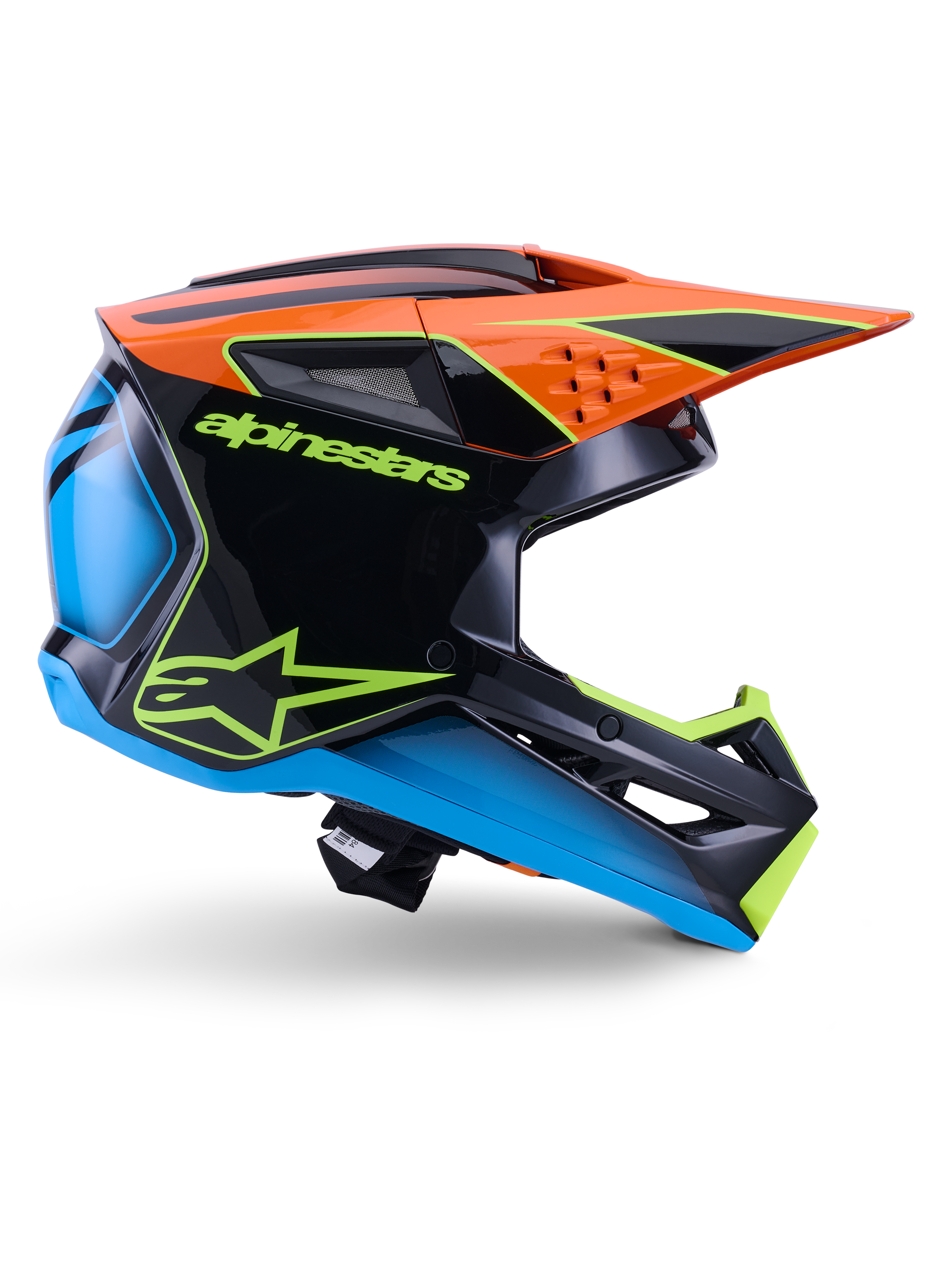Alpinestars S-M3 Fray-hjälm ECE 22.06, motocrosshjälm, svart, orange, blå och neongul, sidoprofil av ett glansigt aerodynamiskt skal med en framträdande orange skärm, neongrön logotyp och blå accenter, skydd för terrängkörning