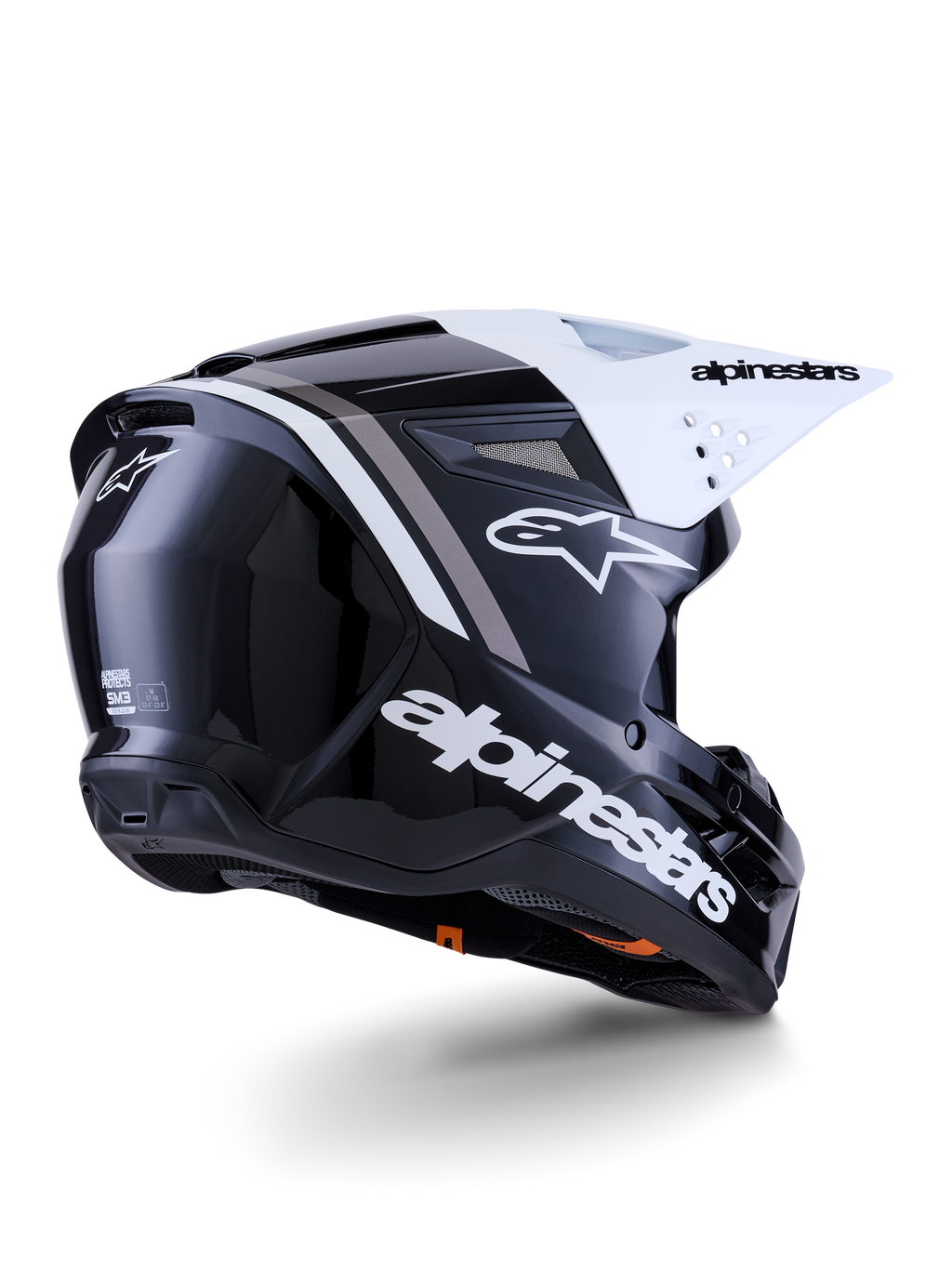 Alpinestars S-M3 Radium Helmet, Motocross Helmet, Black White and Gray Glossy, rear-side view with white visor, featuring bold Alpinestars logo on the side and back, sleek aerodynamic shell with ventilation mesh, designed for off-road motocross and enduro