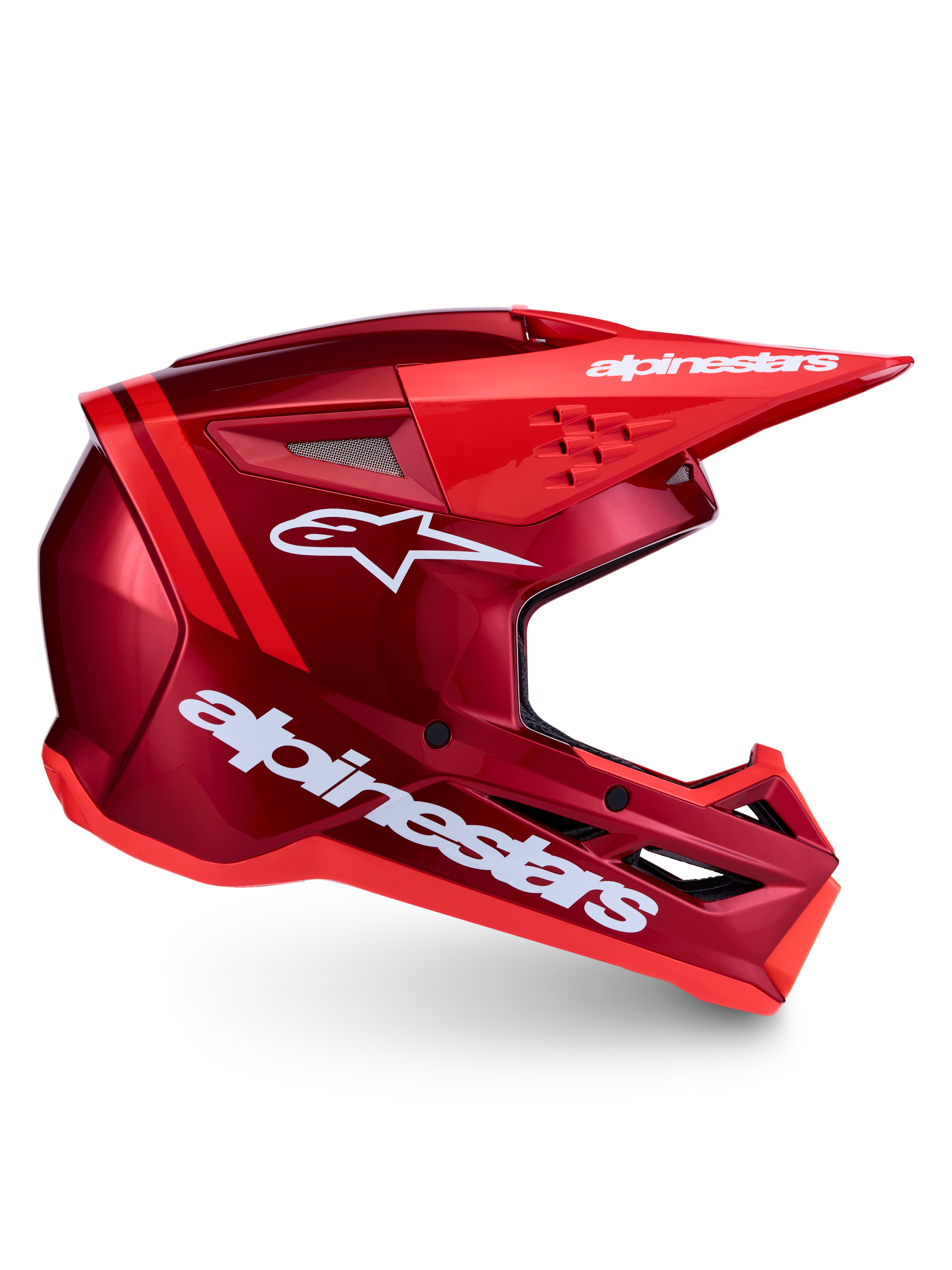Alpinestars SM3 Radium hjälm ECE06, röd och vit motocrosshjälm för terrängkörning med avancerad ventilation och stötskydd, sidoprofil med vit logotyp.