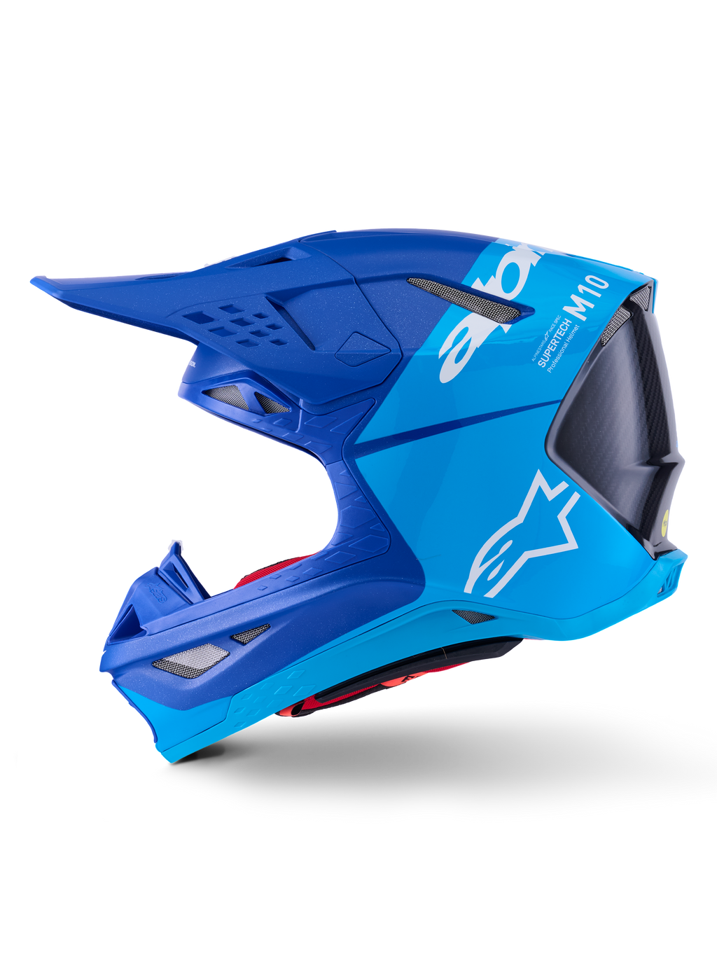 Alpinestars Supertech M10 Flood hjälm, motocrosshjälm, metallicblå och mellanblå med svart kolfiber, sidoprofilvy som visar matta och glansiga ytor, vit Alpinestars-logotyp och Supertech M10-märkning, avancerat huvudskydd för terrängkörning