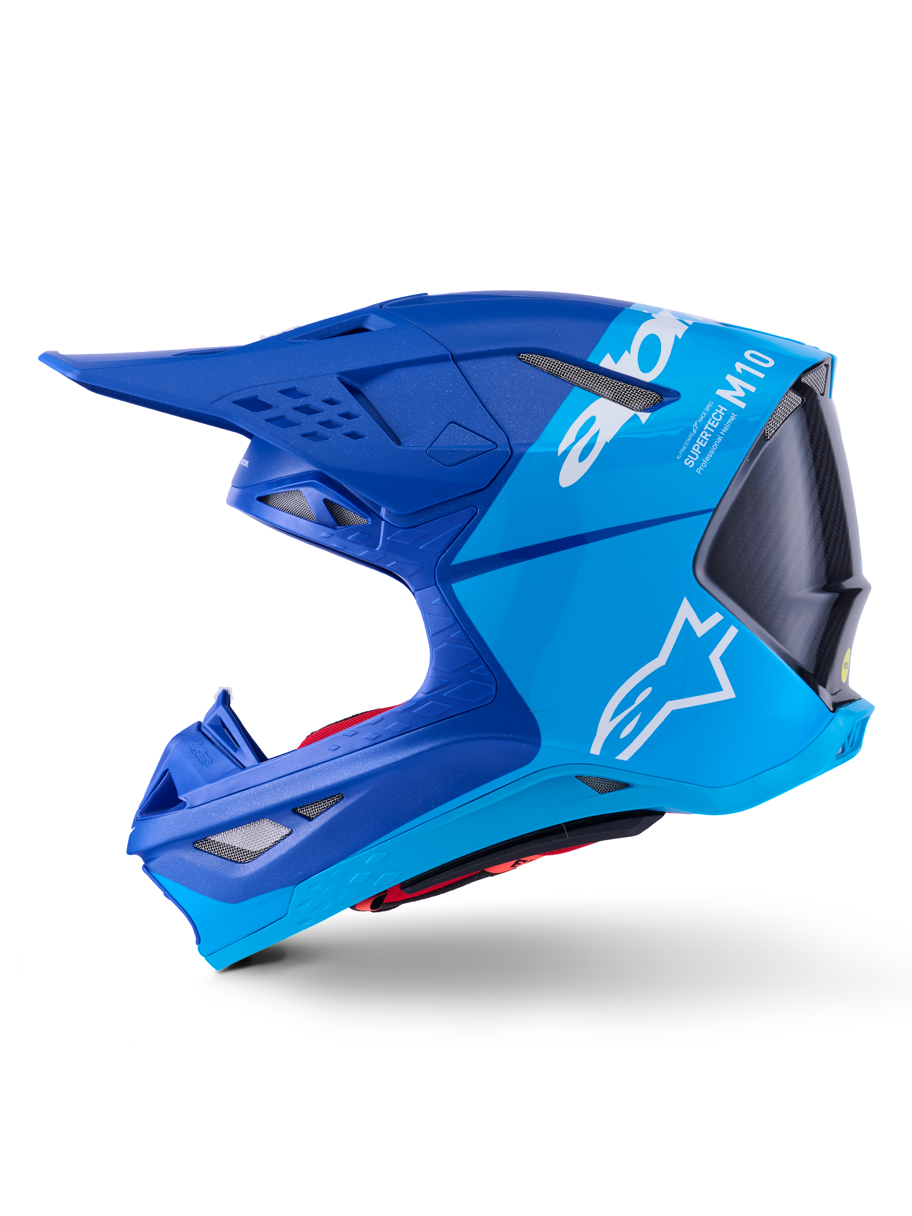 Alpinestars Supertech M10 Flood hjälm, motocrosshjälm, metallicblå och mellanblå med svart kolfiber, sidoprofilvy som visar matta och glansiga ytor, vit Alpinestars-logotyp och Supertech M10-märkning, avancerat huvudskydd för terrängkörning