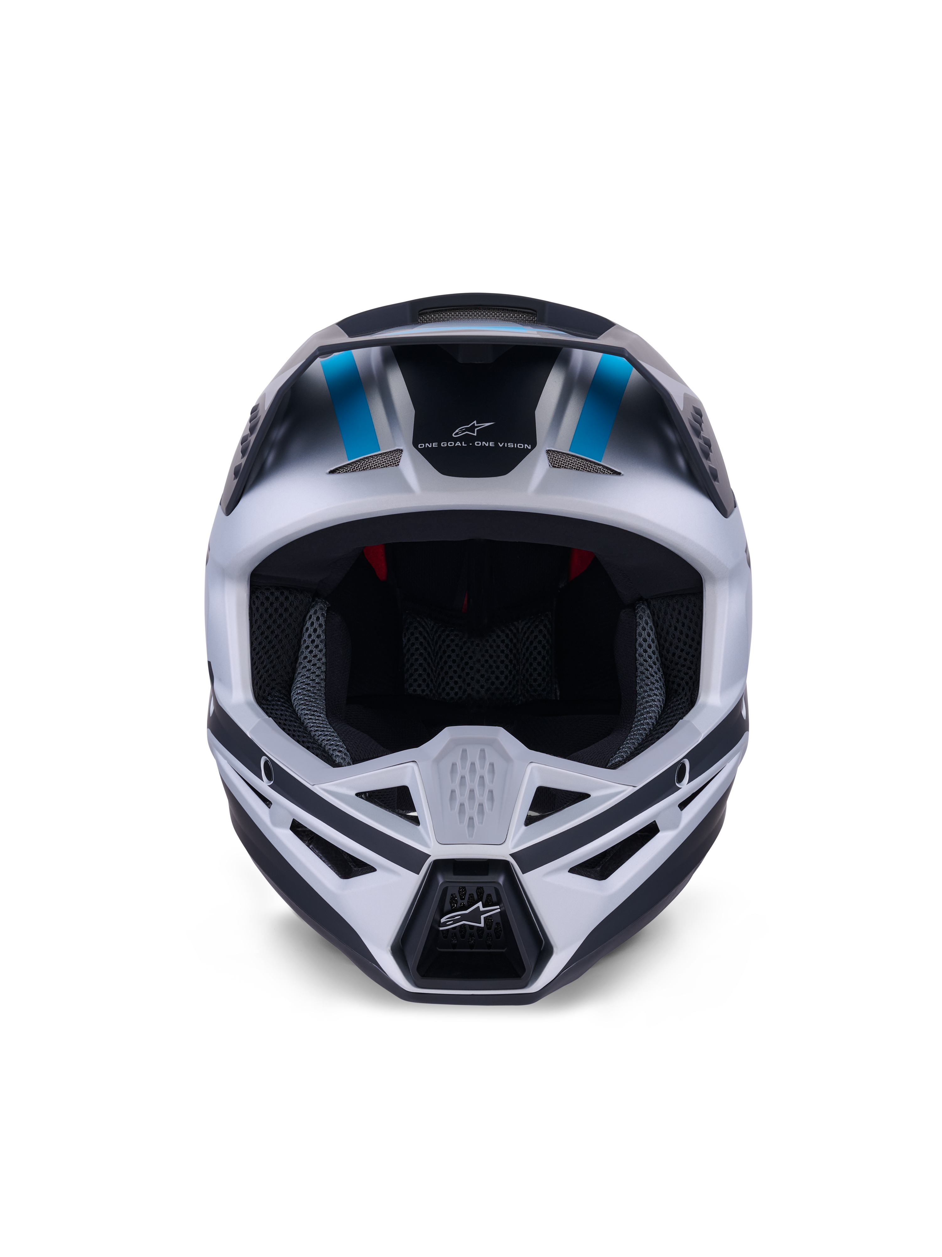 Alpinestars S-M3 Heat-hjälm, motocrosshjälm, silver, blå och mattsvart, vy framifrån som framhäver ventilationssystemet, stort synfält och invändig nätvaddering, med märkets slogan 'ONE GOAL ONE VISION' på pannan.