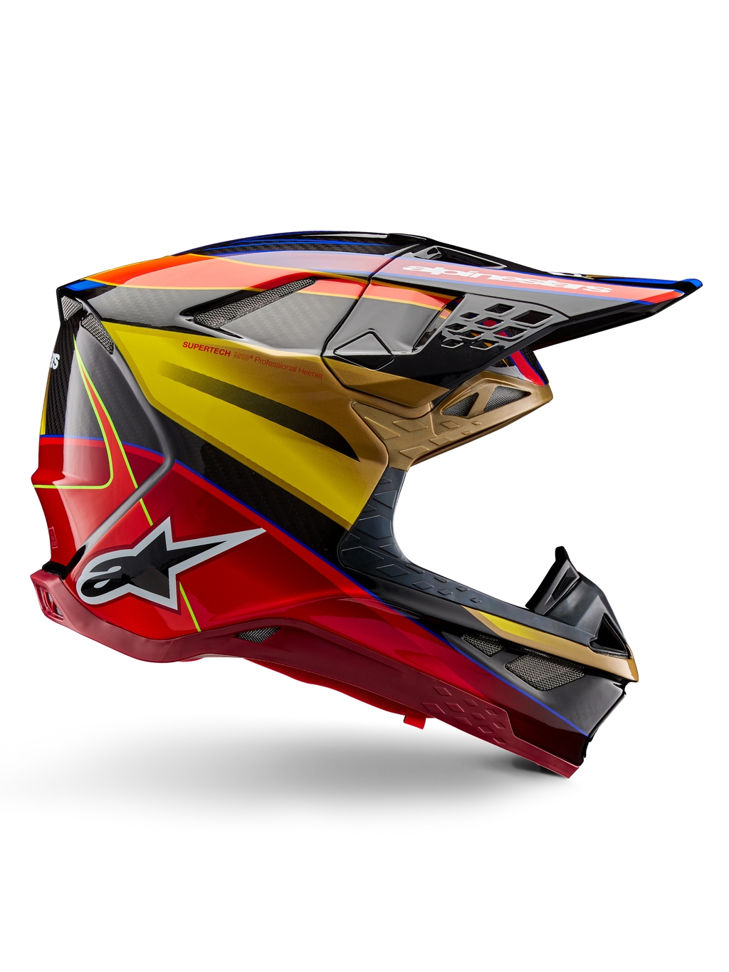 Alpinestars Supertech M10 Era hjälm, motocrosshjälm, blank guldgul och Rio-röd med blå och svarta detaljer, aerodynamisk design med integrerad skärm, flera nättäckta ventilationsöppningar och kolfiberdetaljer, ECE 22.06-certifierad