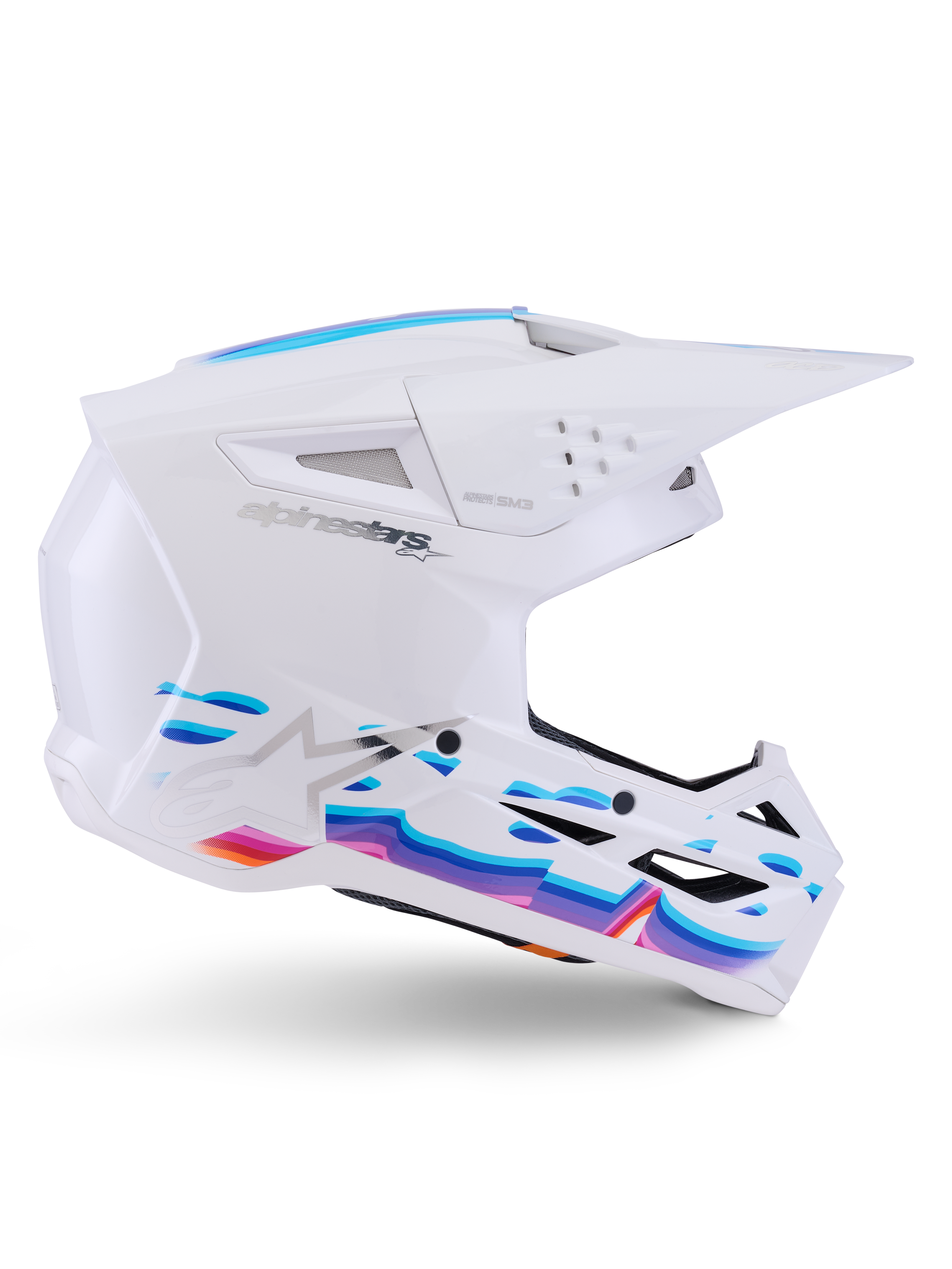 Alpinestars S-M3 Force OCD-hjälm, White Glossy, motocrosshjälm med livfull våggrafik i blått, lila och orange, sidoprofil med aerodynamiskt visir och flera ventilationsöppningar.