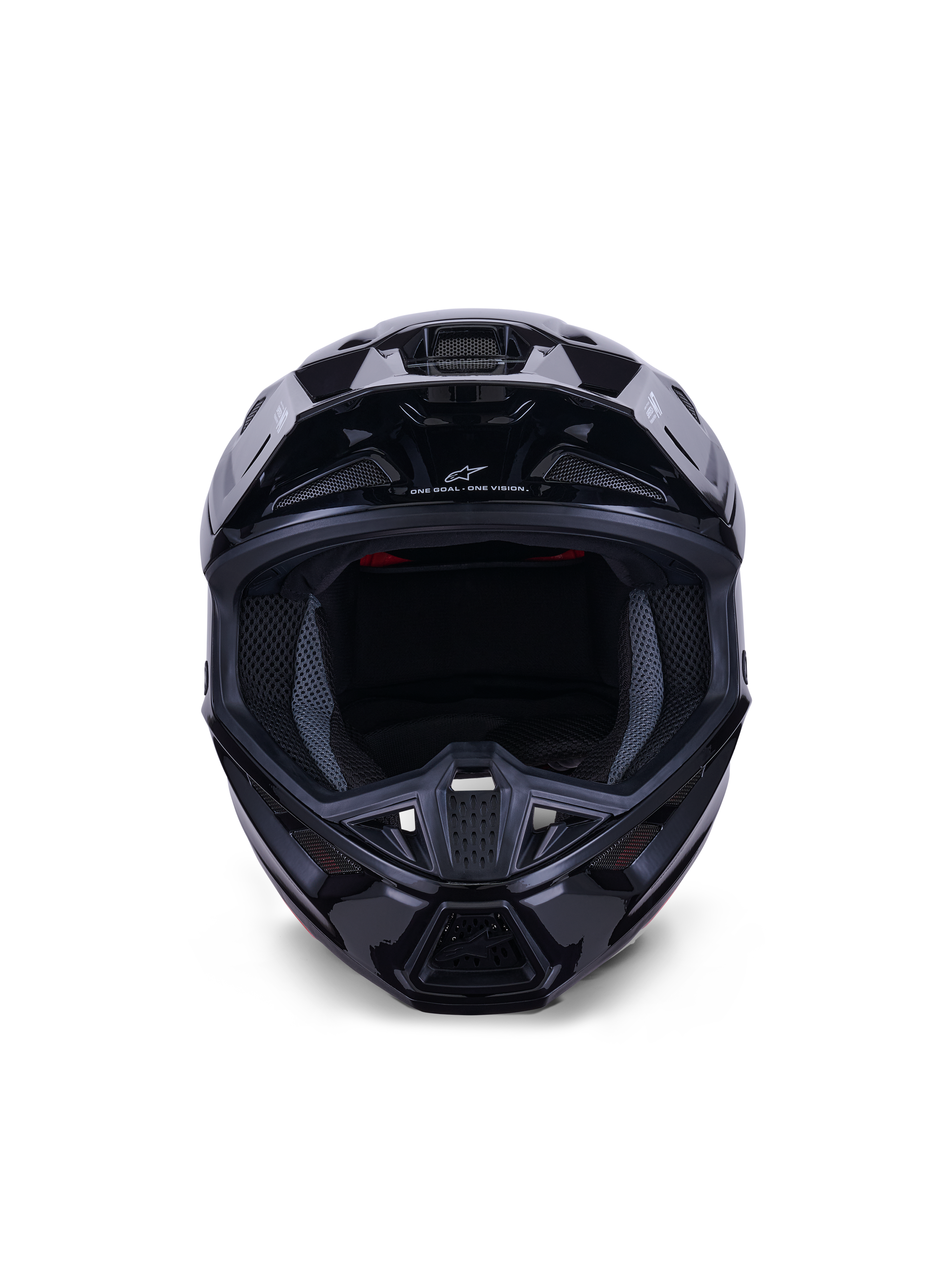 Alpinestars S-M7 Solid hjälm ECE 22.06, motocrosshjälm, Black Glossy, vy framifrån som framhäver det aerodynamiska kompositskalet, ventilationsöppningar på hakpartiet och invändig meshvaddering, strömlinjeformad finish för offroadracing