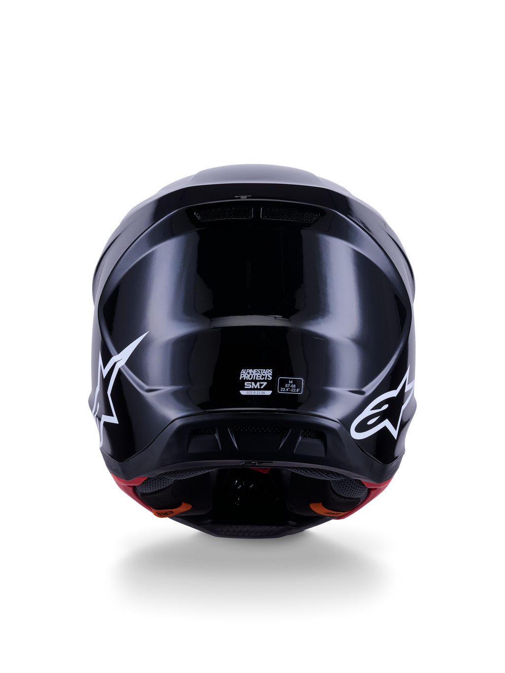 Alpinestars S-M7 Solid-hjälm ECE 22.06, motocrosshjälm, blanksvart, baksida med vita stjärnlogotyper, aerodynamiskt kompositskal med högblank yta, säkerhetscertifiering och storleksetiketter i mitten