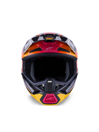 Alpinestars S-M7 Rise-hjälm ECE 22.06, motocrosshjälm, blank finish i svart, gult och rosa med orangea gradienter, vy framifrån som visar aerodynamiskt kompositskal, flera luftintag med nät och 'One Goal. One Vision.'-detaljer, designad för terrängkörning