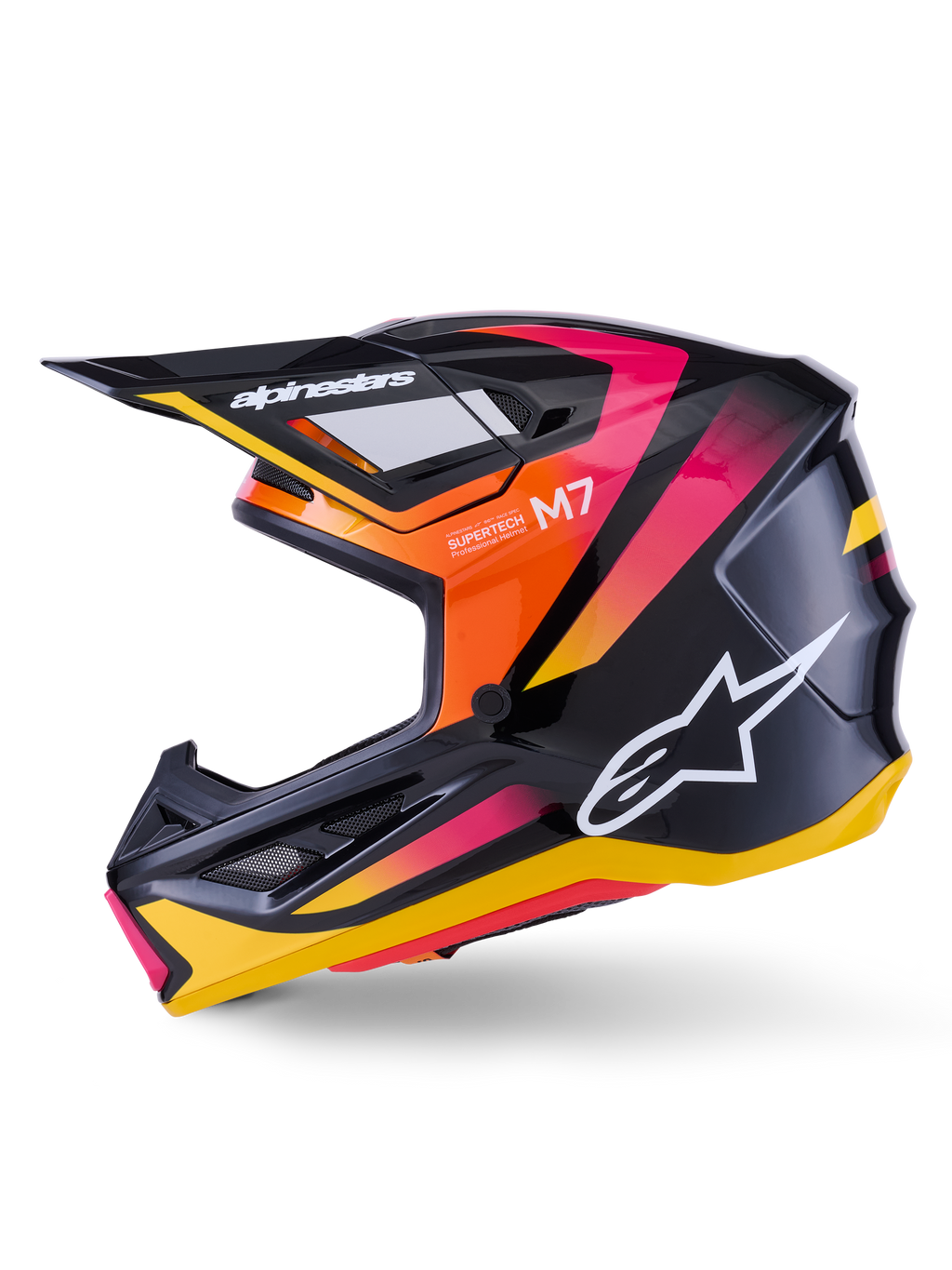 Alpinestars S-M7 Rise-hjälm, motocrosshjälm, glansig svart, gul och rosa, sidoprofil som visar livfulla orangea och rosa gradientdetaljer, vit Alpinestars-logotyp, elegant aerodynamisk design med svart skärm, professionellt huvudskydd för terrängkörning