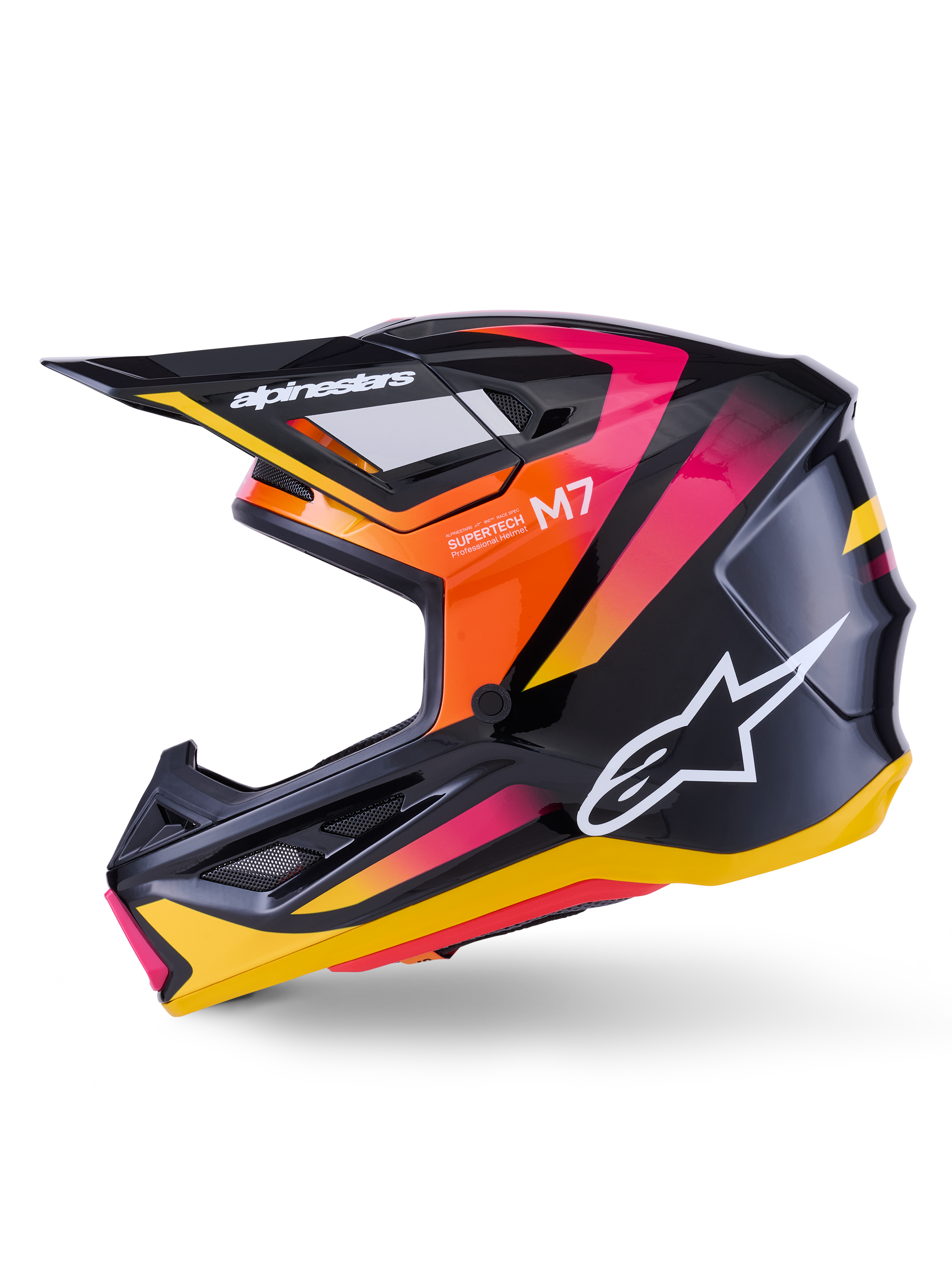 Alpinestars S-M7 Rise-hjälm, motocrosshjälm, glansig svart, gul och rosa, sidoprofil som visar livfulla orangea och rosa gradientdetaljer, vit Alpinestars-logotyp, elegant aerodynamisk design med svart skärm, professionellt huvudskydd för terrängkörning