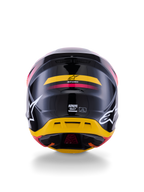 Alpinestars S-M7 Rise-hjälm ECE 22.06, motocrosshjälm, vy bakifrån, glansigt svart med gula och rosa accenter, stora vita logotyper på sidorna, aerodynamiskt kompositskal, racingutrustning för terrängkörning