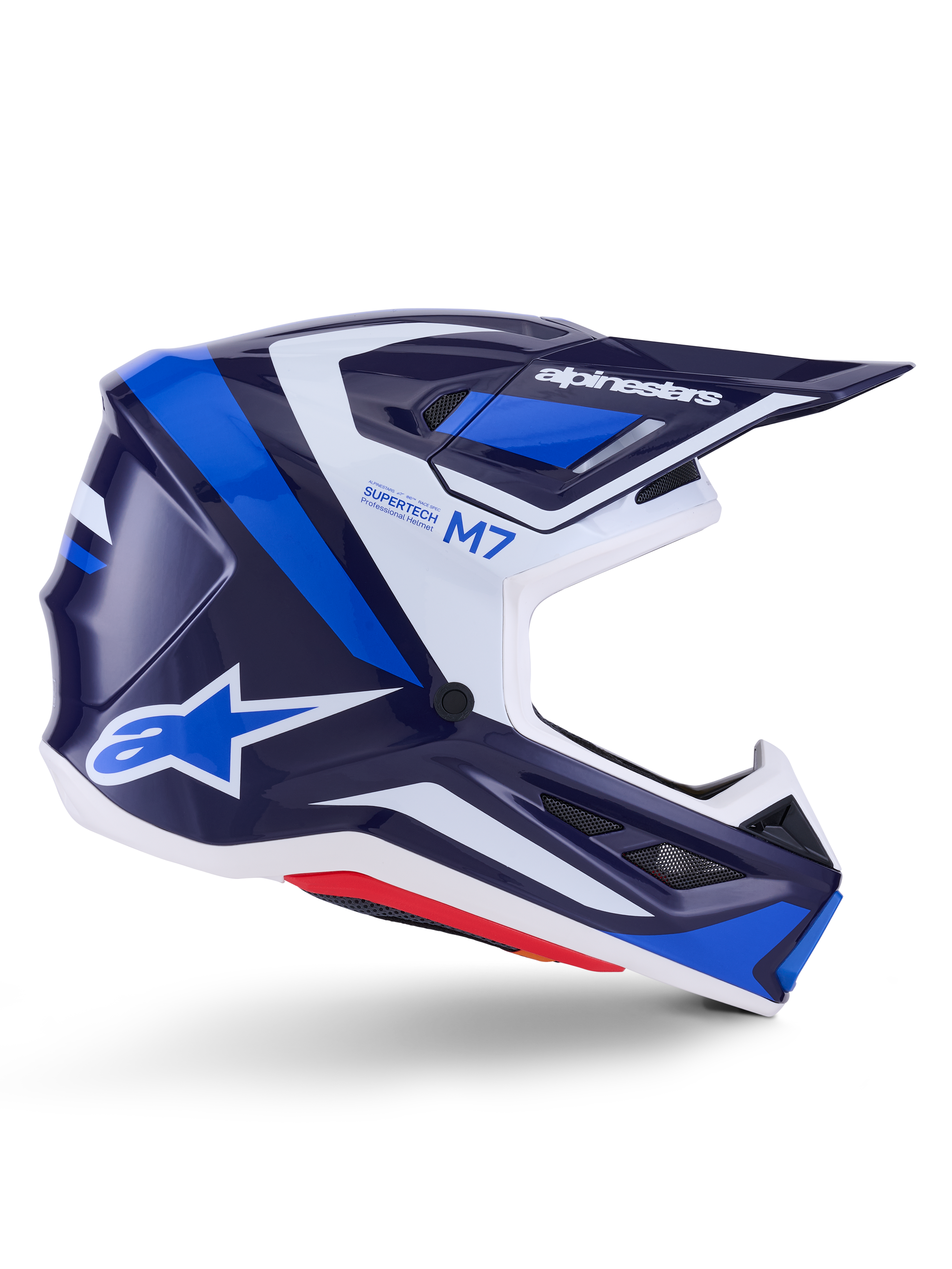 Alpinestars S-M7 Rise hjälm, motocrosshjälm, blå och vit glansig finish, sidoprofil med ett aerodynamiskt kompositskal, ventilerat visir och kantig design med tydlig logotyp, professionellt terrängskydd