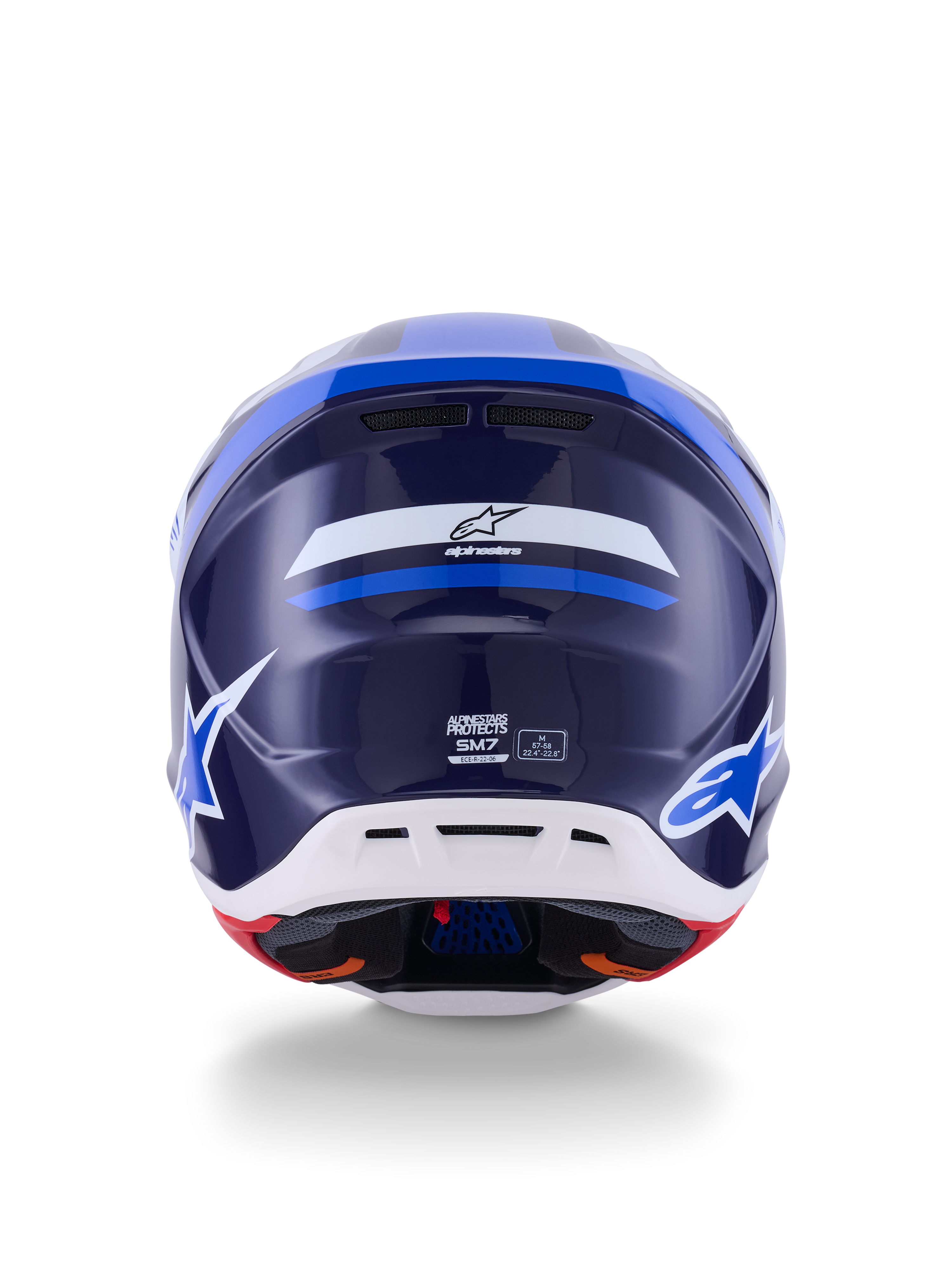 Alpinestars S-M7 Rise-hjälm, vy bakifrån, blå och vit glansig finish, med Alpinestars-logotyp och SM7-profilering, aerodynamiskt kompositskal med vit nederdel och ventilationsöppningar, högpresterande huvudskydd för motocross