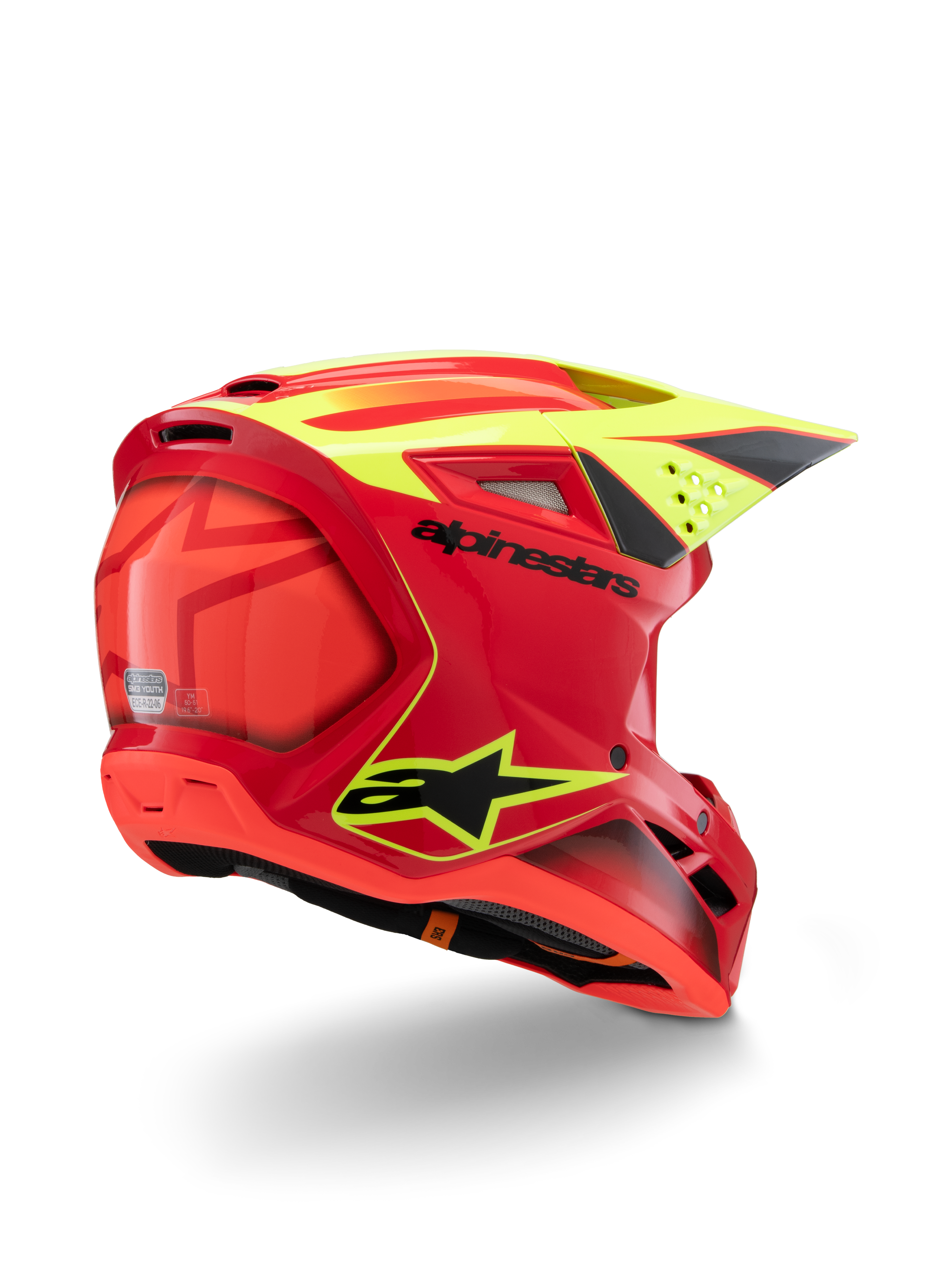 Alpinestars S-M3 Youth Fray-hjälm, röd och neongul blank finish, trekvartsvy bakifrån, med framträdande svarta logotyper och aerodynamiska ventiler, motocrosshjälm med hög synlighet för ungdomar