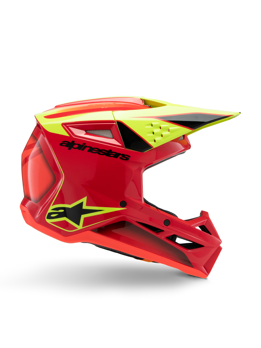 Alpinestars S-M3 Youth Fray-hjälm, motocrosshjälm, röd, neongul och högblank svart, profilvy som visar en strömlinjeformad aerodynamisk design med integrerad skärm och framträdande luftventiler, tydlig svart logotyp på ett rött skal, optimerad för offroad-prestanda för ungdomar
