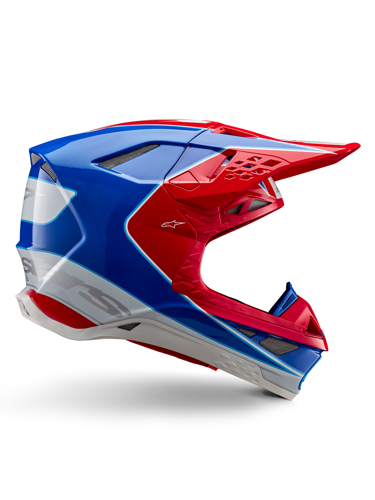Alpinestars Supertech M10 Aeon Helmet, Motocross Racing Helmet, Bright Red, Blue and White, glossy finish, aerodynamic side profile with multiple mesh-covered air vents, angular contours and peak visor