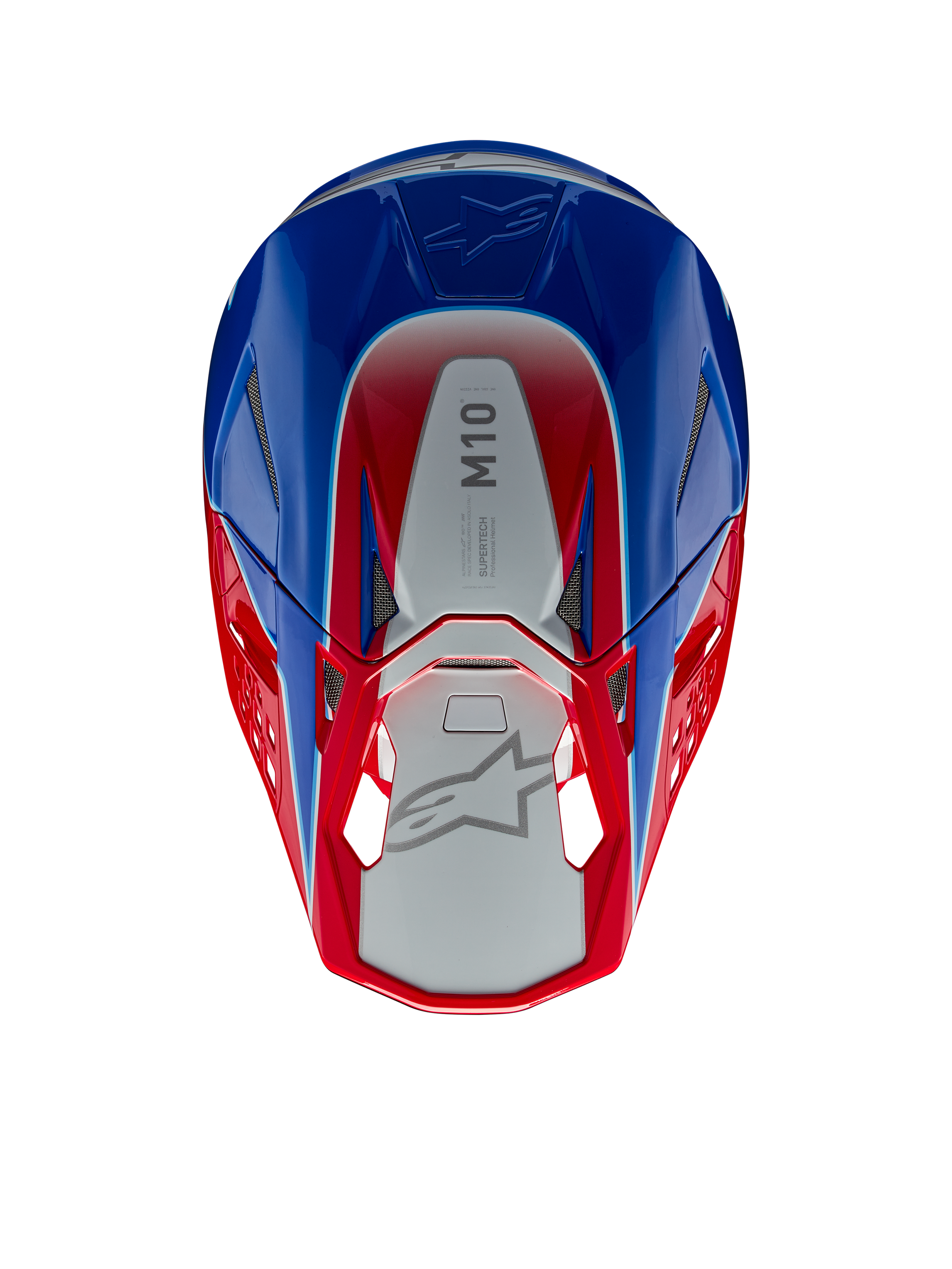 Alpinestars Supertech M10 Aeon hjälm, motocrosshjälm, klarröd och blå glansig, vy uppifrån som visar silverfärgad mittpanel med M10-logotyp, aerodynamiskt skal med röda och blå accenter, ventilationsportar i nät, högpresterande huvudskydd för motocross