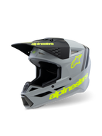 Alpinestars S-M3 Radium-hjälm för ungdomar ECE 22.06, motocrosshjälm, matt grå och svart med neongula detaljer, framträdande Alpinestars-logotyp och stjärnsymbol, skyddsutrustning för terrängkörning för ungdomar
