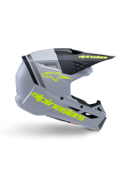 Alpinestars S-M3 Youth Radium-hjälm ECE 22.06, motocrosshjälm för ungdom, mattgrå och svart med neongul branding, sidoprofil som visar Alpinestars logotyp och text, aerodynamisk design med integrerad ventilation och svart visir.