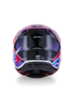 Alpinestars S-M7 Fuse-hjälm, motocrosshjälm, vy bakifrån, blank blå, lila och rosa, livfull rosa och lila grafik på ett blankt svart skal, med ventilationsöppningar och ECE 22.06-certifieringsetikett