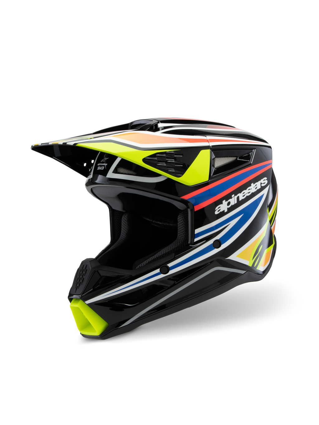 Alpinestars S-M3 Youth Wurx-hjälm ECE 22.06, motocrosshjälm, blanksvart med racinggrafik i fluorescerande gult, blått och rödorange, trekvartsvy som framhäver det aerodynamiska skalet med flera luftintag och utsläppsportar, skyddande terrängutrustning för ungdomsförare