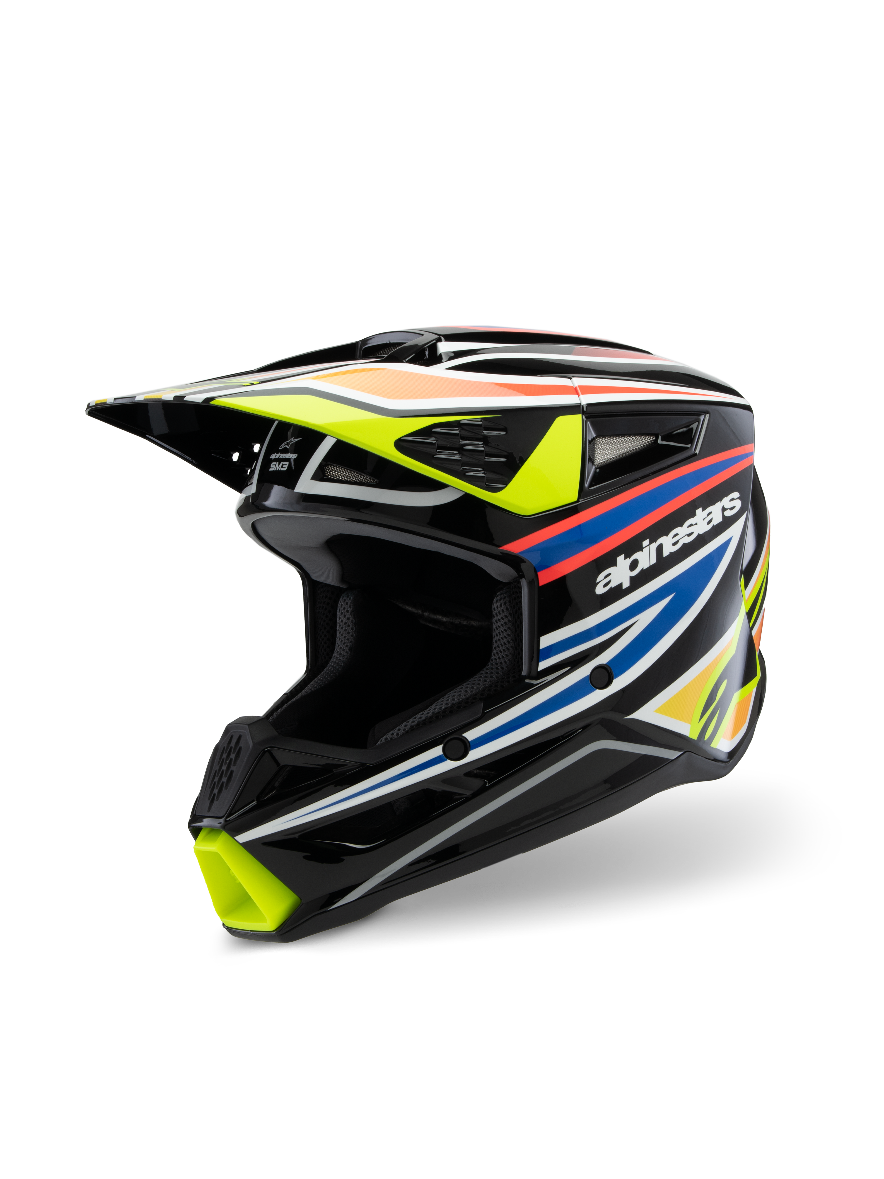 Alpinestars S-M3 Youth Wurx-hjälm ECE 22.06, motocrosshjälm, blanksvart med racinggrafik i fluorescerande gult, blått och rödorange, trekvartsvy som framhäver det aerodynamiska skalet med flera luftintag och utsläppsportar, skyddande terrängutrustning för ungdomsförare