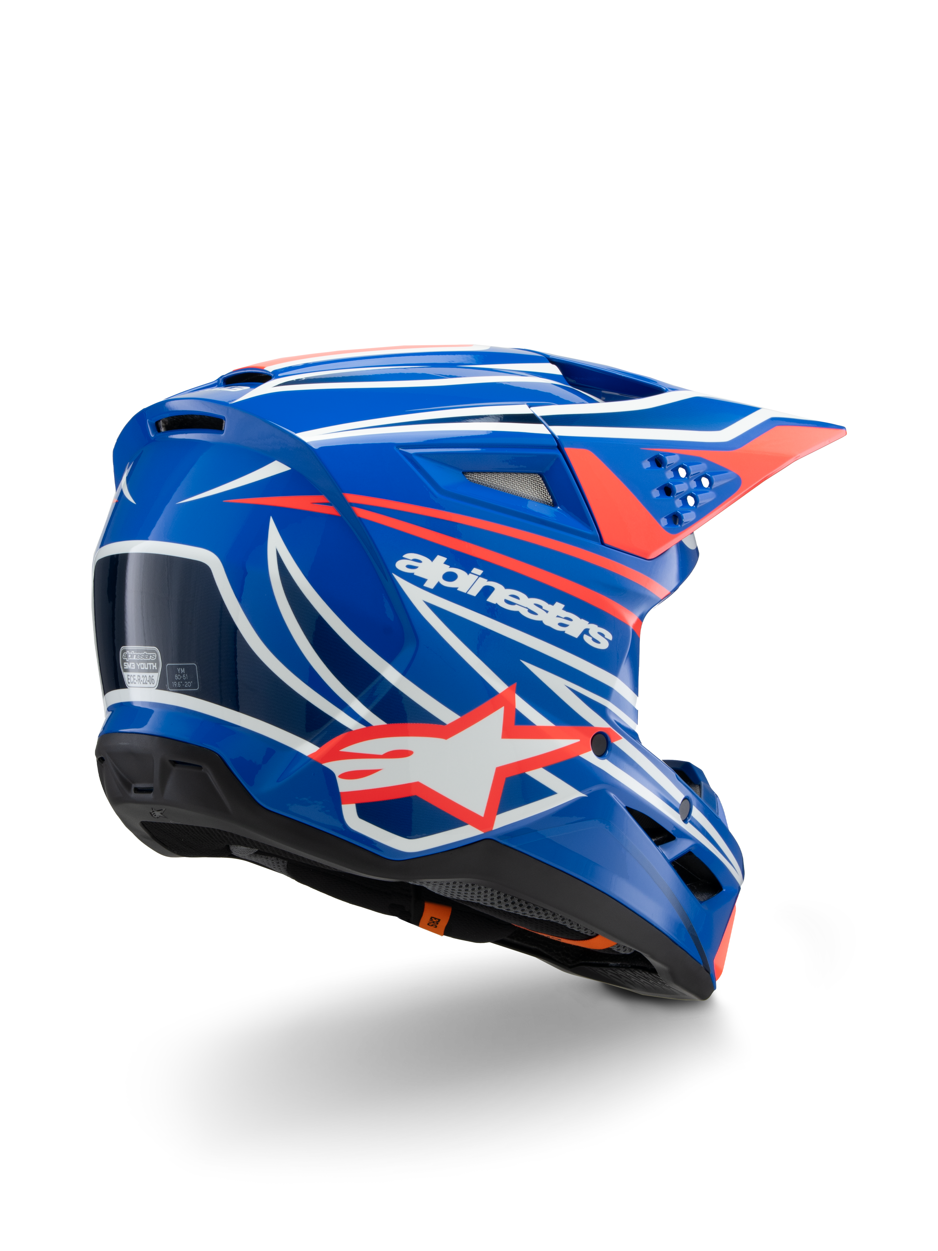 Alpinestars S-M3 Youth Wurx-hjälm, motocrosshjälm, glansig blå med röd, vit och svart grafik, vy snett bakifrån som visar det aerodynamiska skalet, ventilationsöppningar och tydlig Alpinestars-logotyp, skyddsutrustning för terrängkörning
