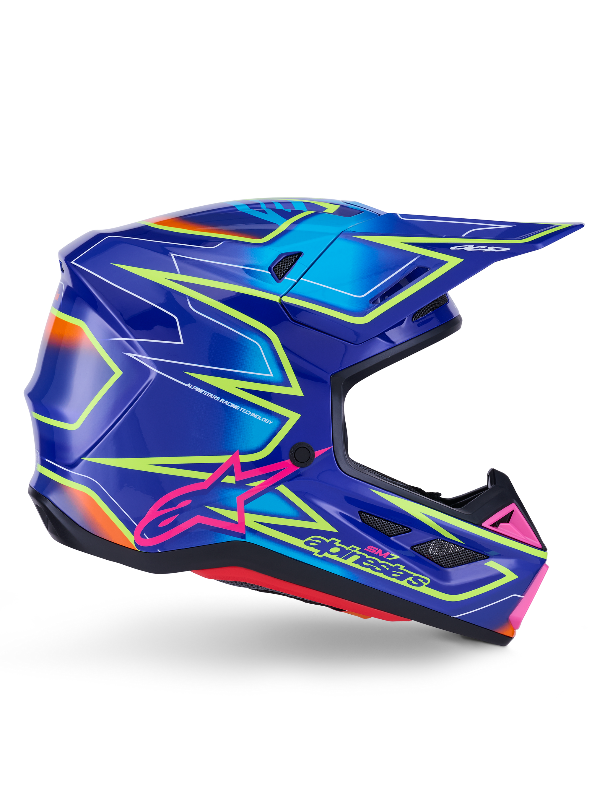Alpinestars S-M7 Cast Helmet, motocrosshjälm, blå, rosa och neongul glansig finish, sidoprofil med framträdande geometriska mönster, rosa Alpinestars-logotyp och ventilerat aerodynamiskt skal.