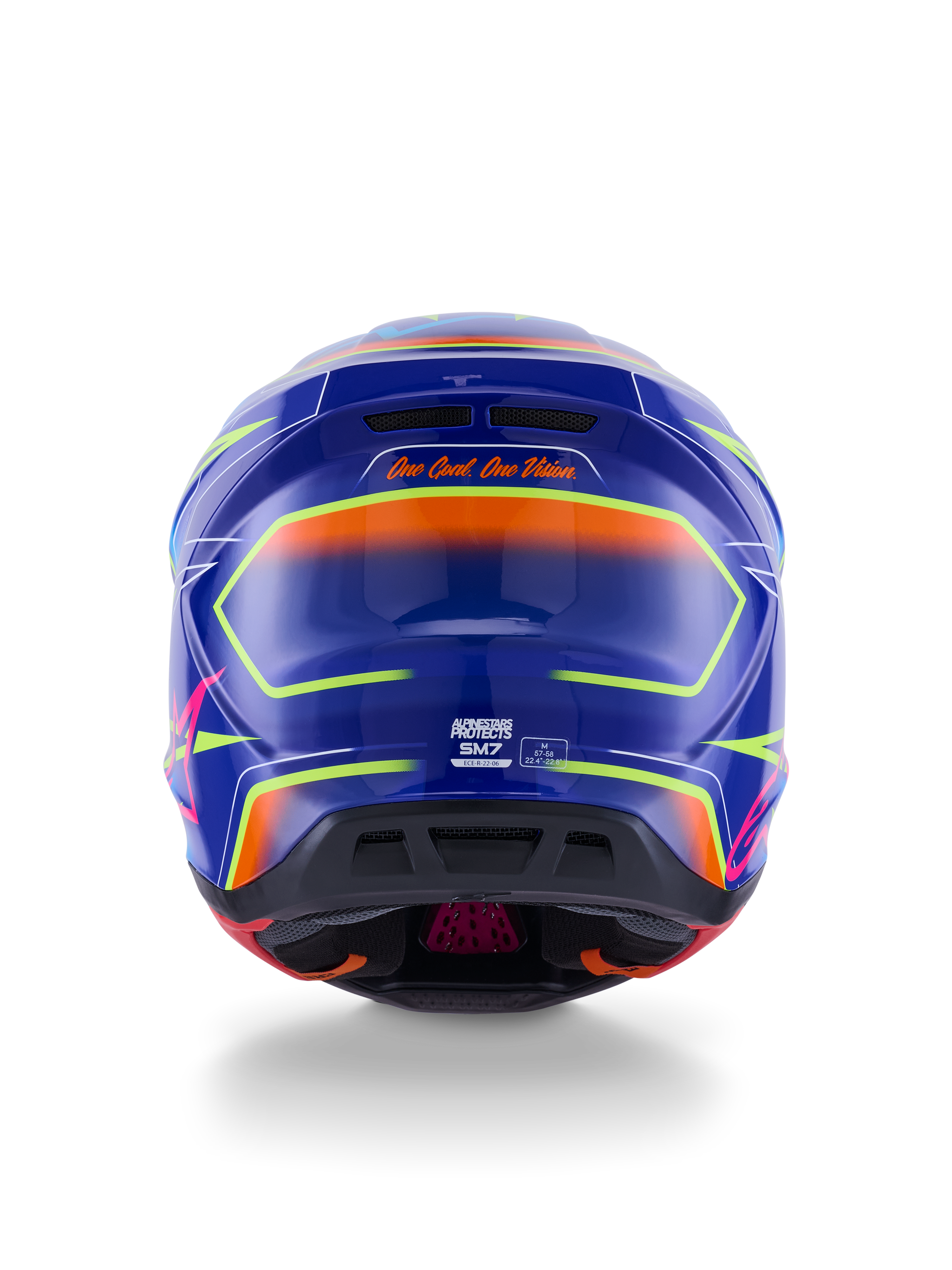 Alpinestars S-M7 Cast-hjälm ECE 22.06, motocrosshjälm, blå, rosa och neongul blank finish, vy bakifrån som visar sloganen 'One Goal. One Vision.', aerodynamiskt kompositskal med integrerade ventilationsportar och livfulla neonaccenter