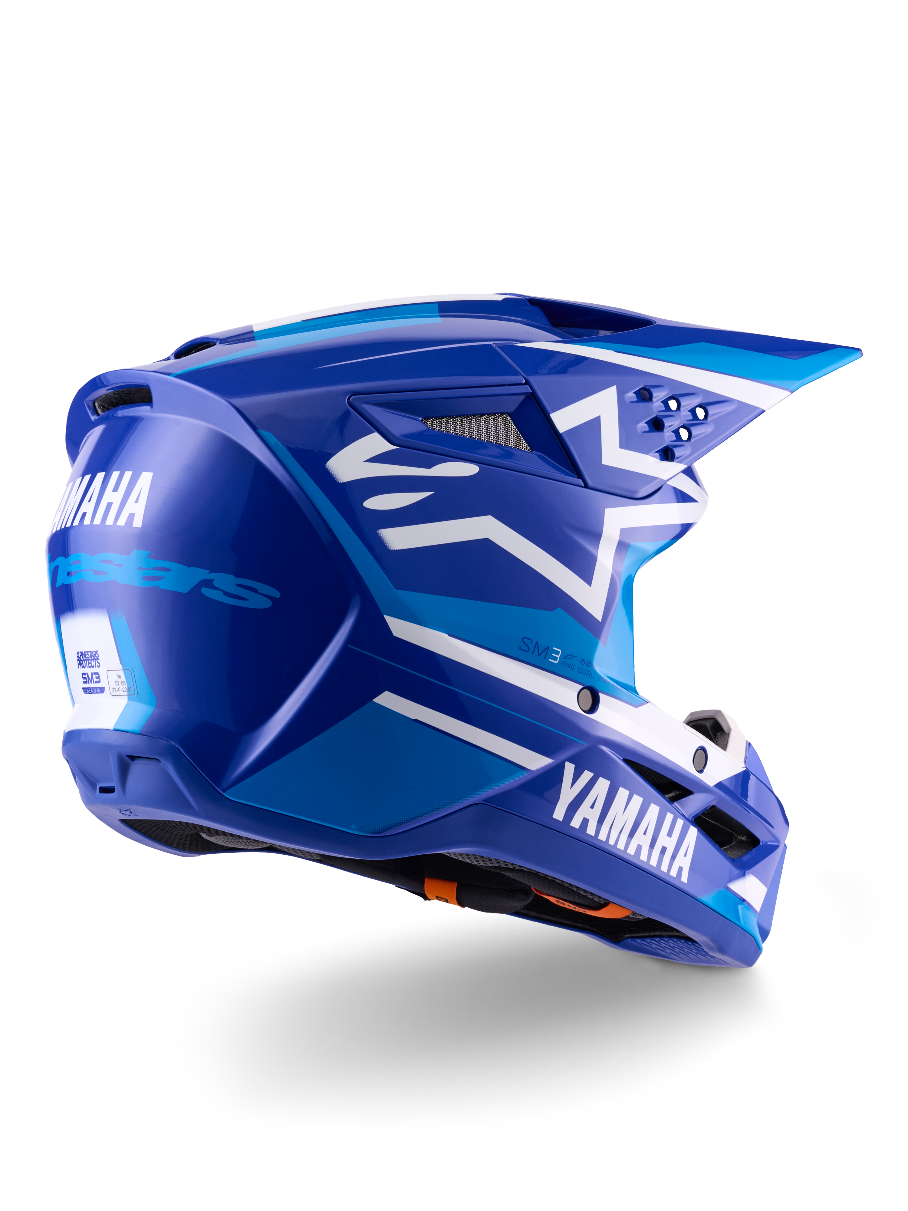 Alpinestars Yamaha S-M3-hjälm ECE 22.06, motocrosshjälm, blå och vit glansig, med Yamaha- och Alpinestars-logotyper, vit stjärnlogotyp på sidan, flera luftintag och utloppsventiler, aerodynamisk design för terrängprestanda