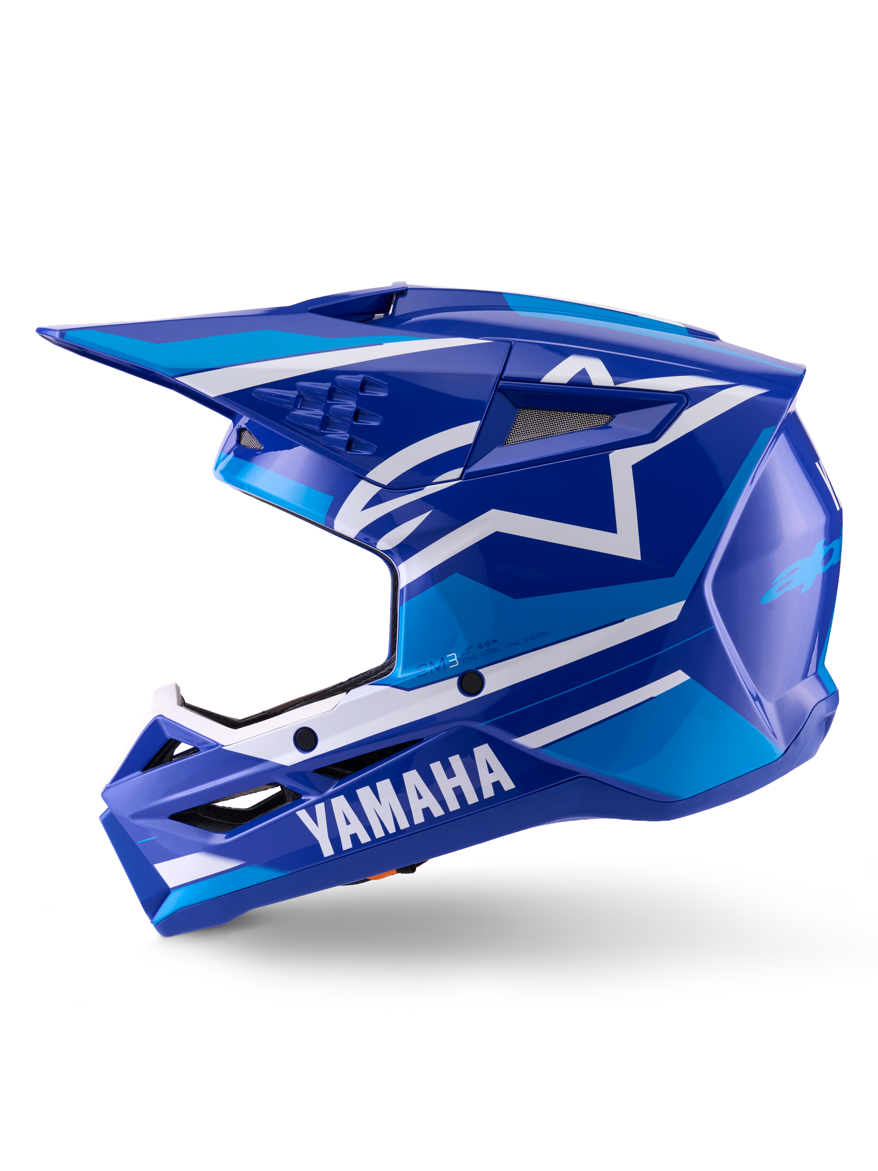 Alpinestars Yamaha S-M3-hjälm, motocrosshjälm, blå och vit glansig finish, sidoprofil med Yamaha-logotyp på hakskyddet och Alpinestars stjärnlogotyp, aerodynamiskt skal med ventilationsportar för terrängkörning