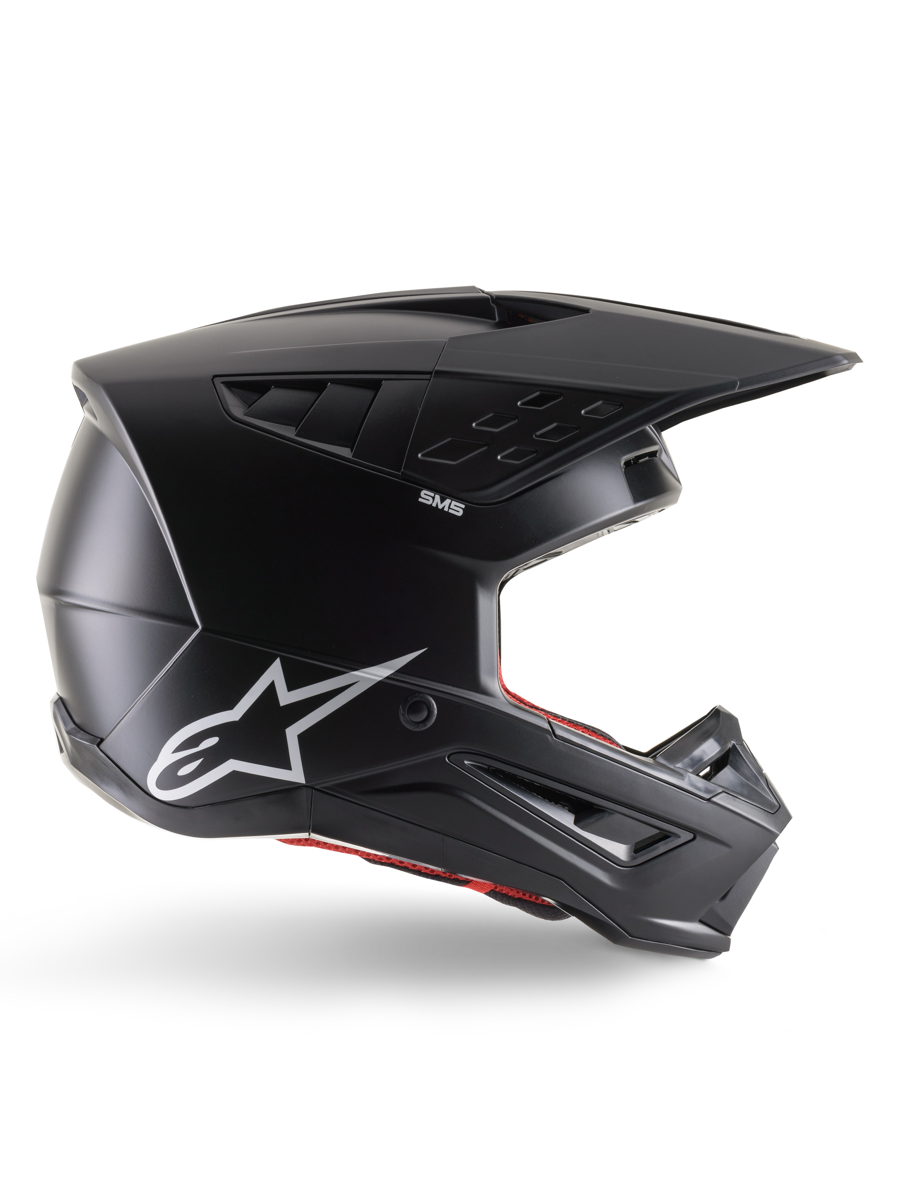 Alpinestars S-M5 Solid Helmet, Motocross Helmet, Matte Black, featuring white Alpinestars star logo and red interior lining, aerodynamic design with multiple air vents and long visor, ECE 22.06 certified off-road protection