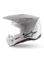 Alpinestars S-M5 Solid Helmet ECE 22.06, Motocross Helmet, White Glossy, side profile view with angular shell design, black Alpinestars logo on the side, multiple ventilation ports, and integrated visor for off-road racing.
