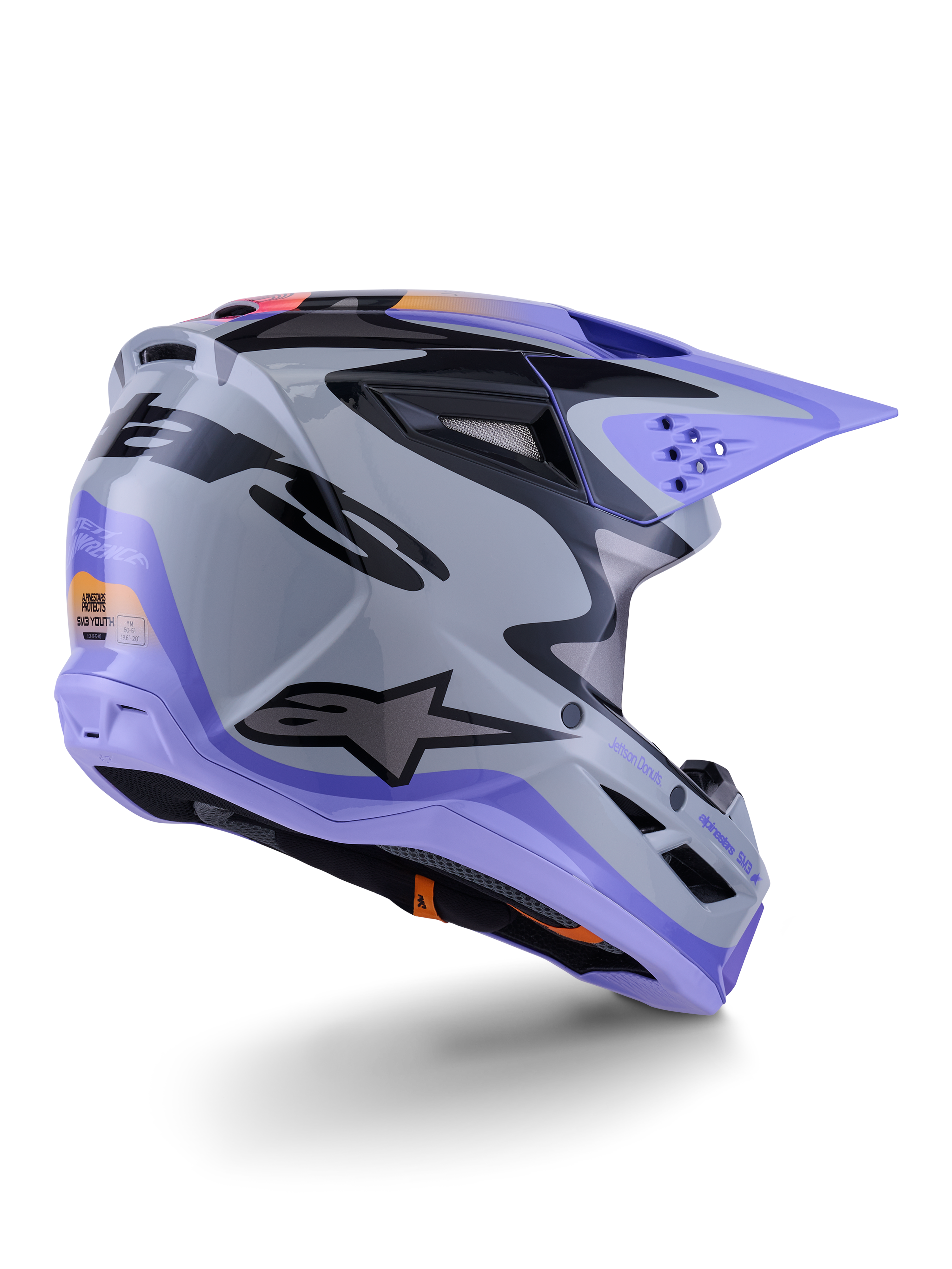 Alpinestars S-M3 Jettson ungdomshjälm, motocrosshjälm, grå, lila och svart glansig, trekvartsvy bakifrån, med lila visir, svart Alpinestars-logotyp och flera ventilationsöppningar, strömlinjeformad design för terrängkörning för ungdomar