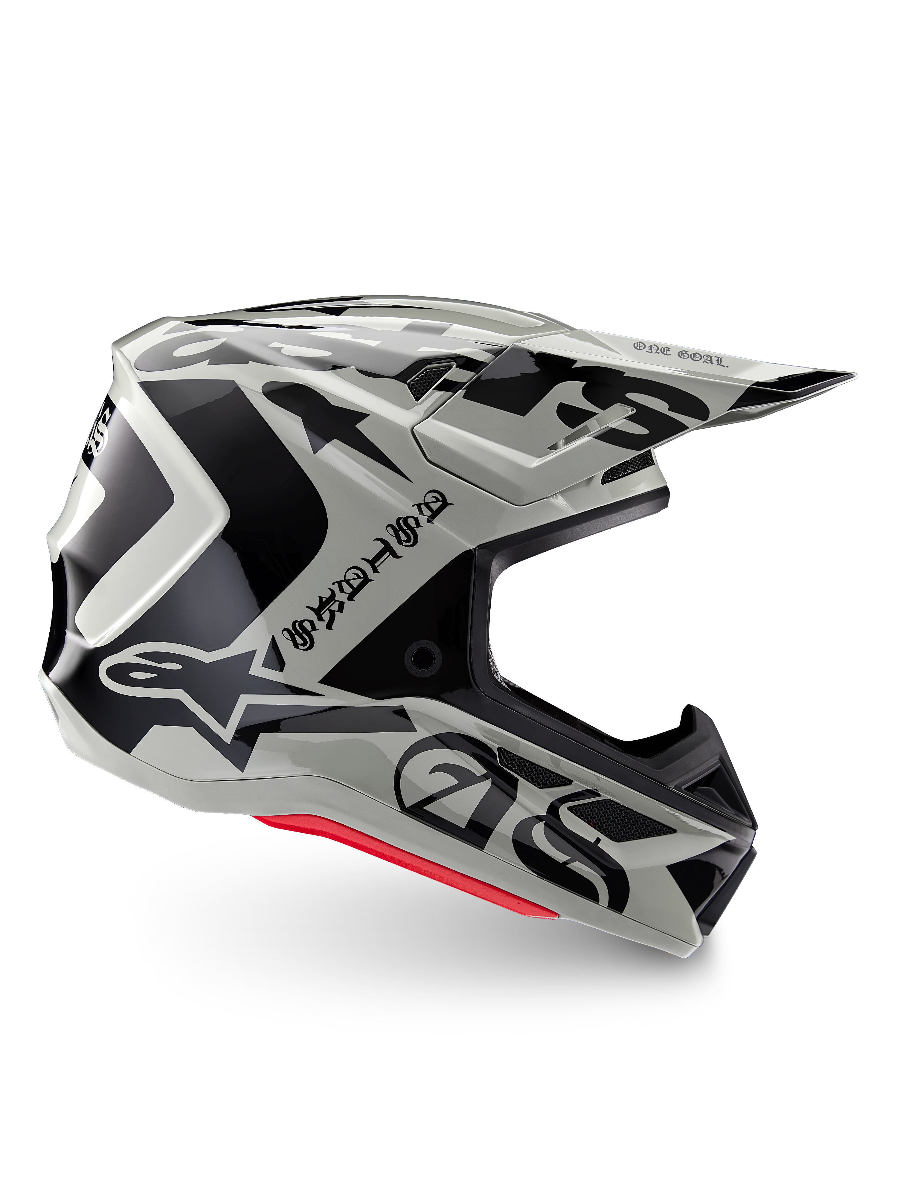 Alpinestars Limited Edition S-M7 Wolf Dust-hjälm, motocrosshjälm i Dune Black Glossy, sidoprofil med djärv svart grafik och logotyper, röda accenter nertill, aerodynamiskt huvudskydd för terrängkörning