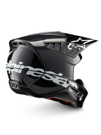 Alpinestars S-M5 Corp hjälm ECE 22.06, mörkgrå glansig och vit motocrosshjälm, ECE-certifierad för terrängkörning.