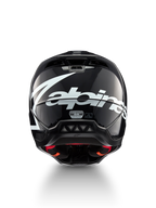 Alpinestars S-M5 Corp motocrosshjälm, mörkgrå glansig, storlek M, vy bakifrån med vit logotyp, ECE 22.06-certifierad.