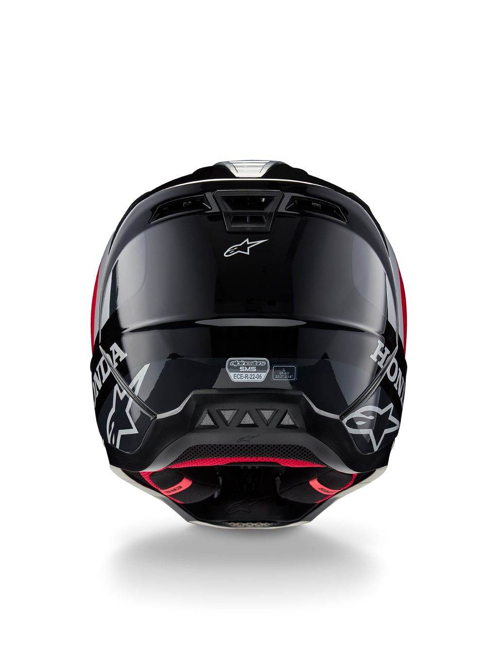 Alpinestars Honda S-M5 ECE-hjälm, motocrosshjälm, blank svart och röd, baksida som visar ett blankt svart skal med vita Honda- och Alpinestars-logotyper, rött innerfoder och ECE-säkerhetscertifieringsetikett