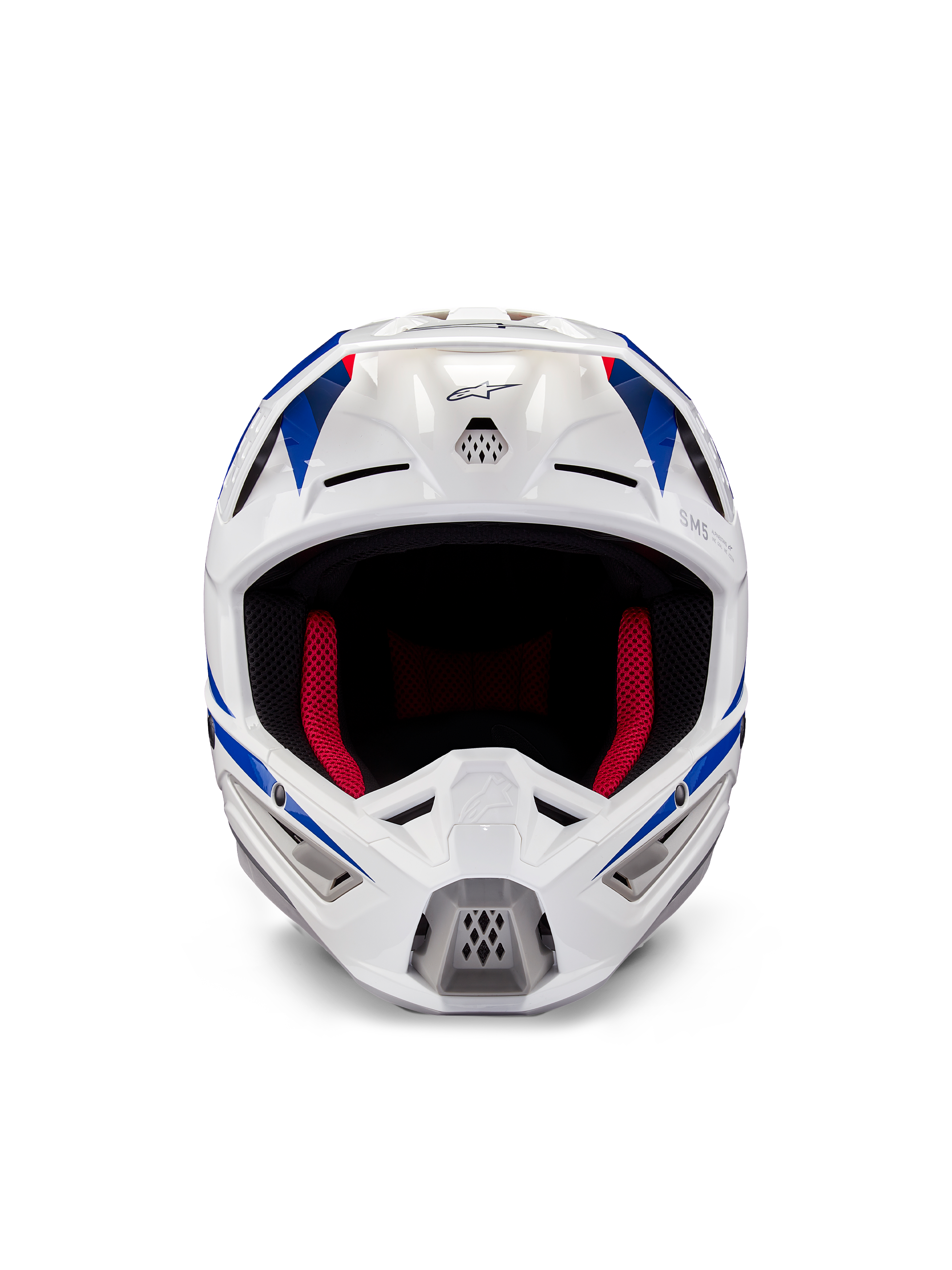 Alpinestars Honda S-M5 ECE-hjälm, motocrosshjälm, vit, blå och röd glansig finish, vy framifrån som visar ventilationsöppningar och röd innerstoppning, aerodynamisk design för skydd vid terrängkörning
