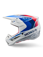 Alpinestars Honda S-M5 ECE-hjälm, vit, blå och röd med blank finish, sidoprofil, med tydlig Honda-logotyp och Alpinestars stjärnlogotyp, aerodynamisk motocrossdesign med flera luftventiler och en framträdande skärm, blank finish