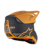 Alpinestars Missile Tech Racer Helmet, Full-Face MTB Helmet, Black and Dark Gold Matt, rear side view featuring mesh ventilation ports, aerodynamic visor, and Alpinestars Protects branding on the back, professional downhill cycling protection.