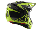 Alpinestars Missile Tech-Air Full Face Helmet, Black and Yellow Fluo Glossy, rear three-quarter view featuring large mesh ventilation ports, ASTARS branding, and red interior lining, designed for downhill MTB performance.