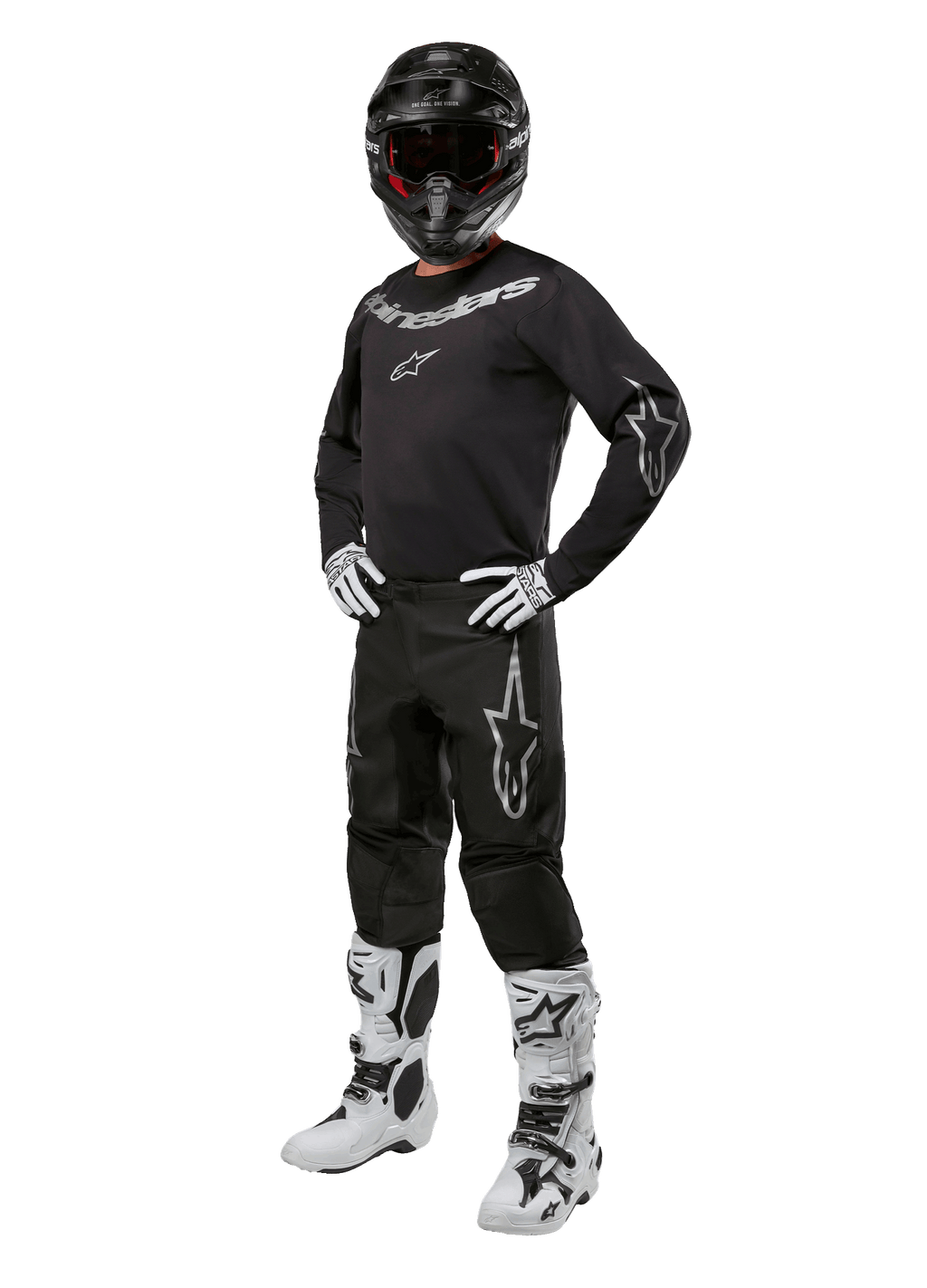 Alpinestars 2024 Fluid Graphite Gear Set, Complete Motocross Racing Outfit, Black with Gray and White Logos, featuring jersey and pants worn with matching black helmet, white and black gloves and boots, designed for off-road protection