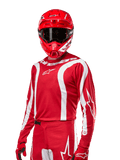 2024 Fluid Lurv Jersey, motocrosströja, Mars Red och vit, bärs med matchande röd hjälm och handskar, djärv sportig design med vita svängda ränder och Alpinestars-logotyper