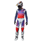 Alpinestars 2024 Racer Hoen byxor, komplett motocrossoutfit för terrängkörning, ljusgrå byxor med detaljer i stark orange och lila, matchande tröja med färgövergång, vit och lila hjälm, vita stövlar och svarta handskar.